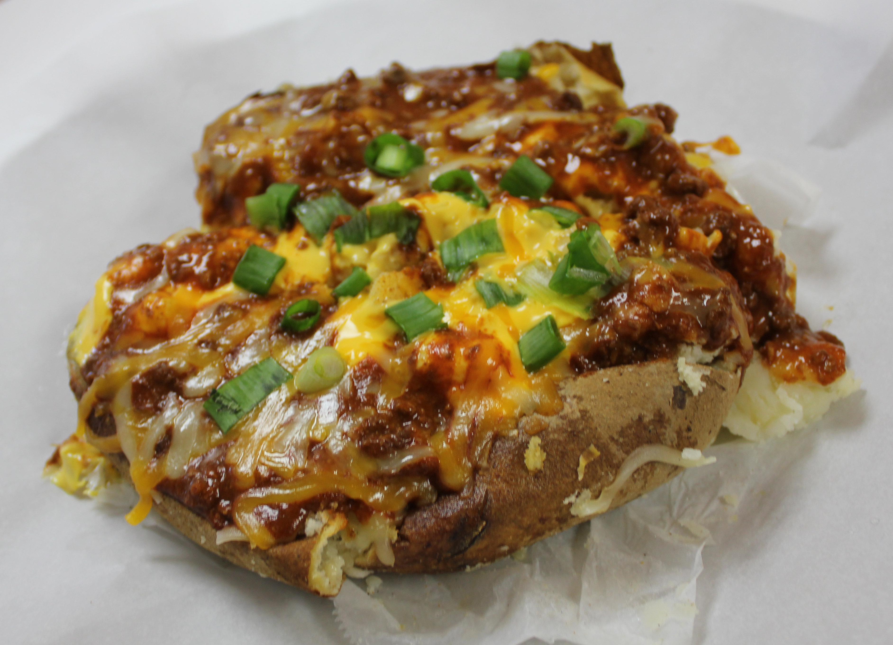Order 3. Chili and Cheese Baked Potato food online from Georgia Potato Factory store, Fayetteville on bringmethat.com