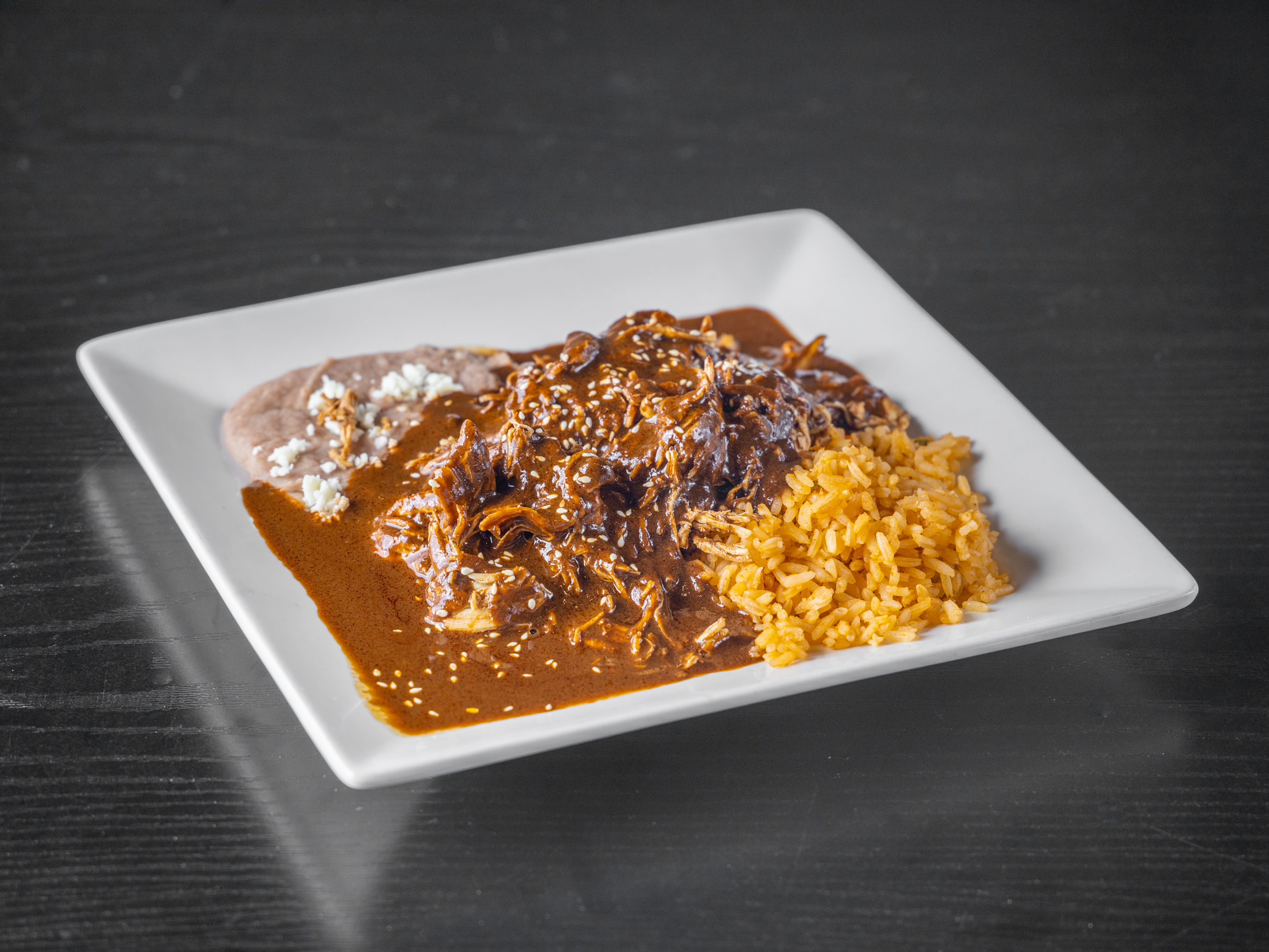 Order Mole Poblano food online from Tulum Kitchen store, Los Angeles on bringmethat.com