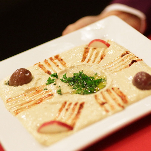 Order Hummus food online from The Olives Branch store, San Juan Capistrano on bringmethat.com