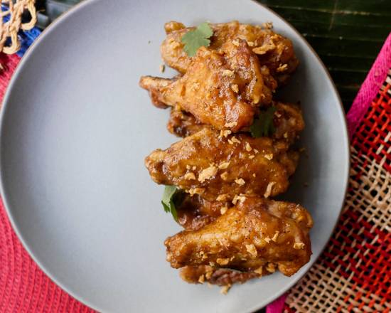 Order GARLIC ADOBO WINGS food online from Uncle Tito store, San Francisco on bringmethat.com