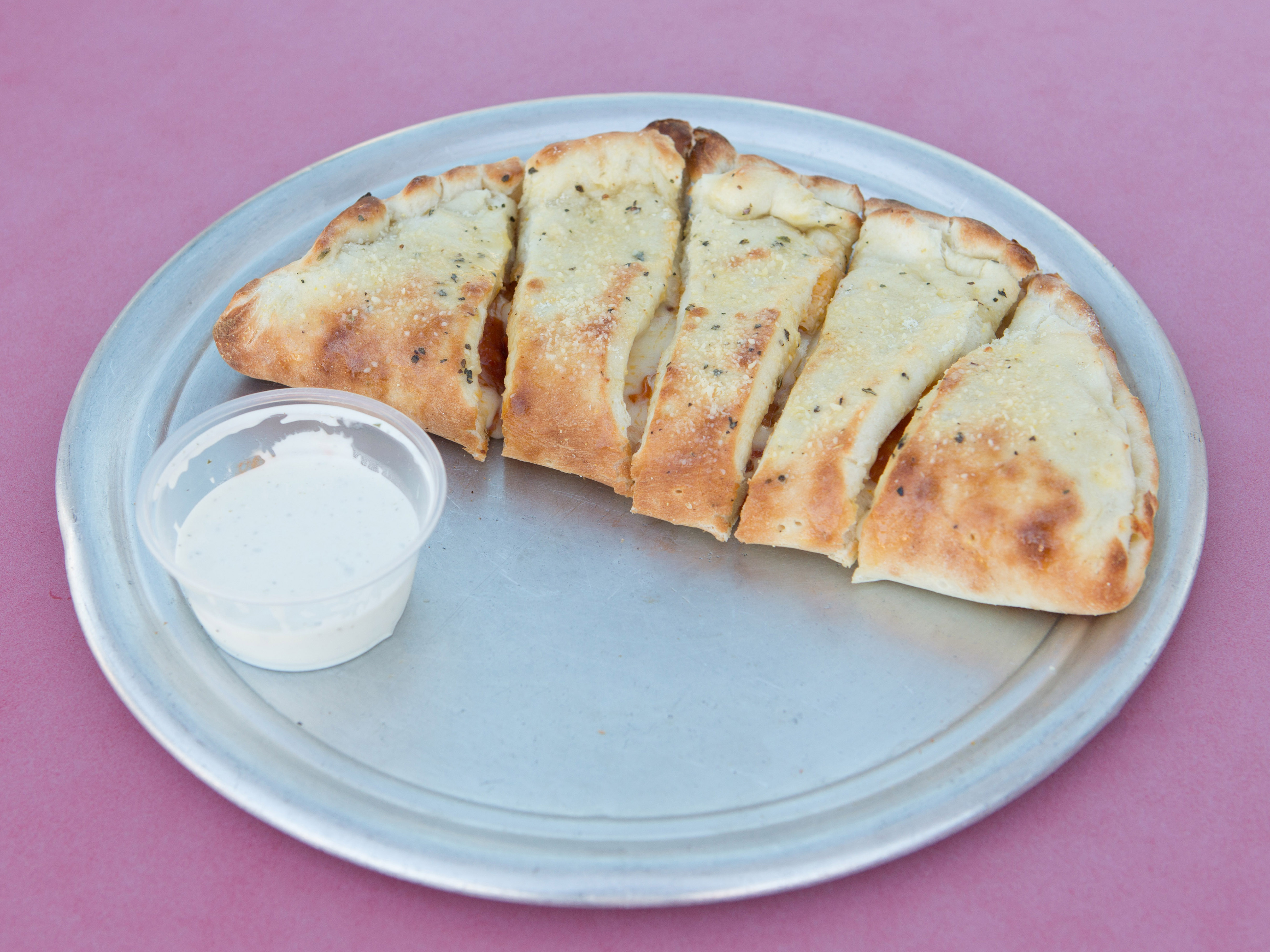 Order New York Calzone 10” 3 toppings  food online from Papa G's Pizza, Pasta Cafe store, Wildomar on bringmethat.com