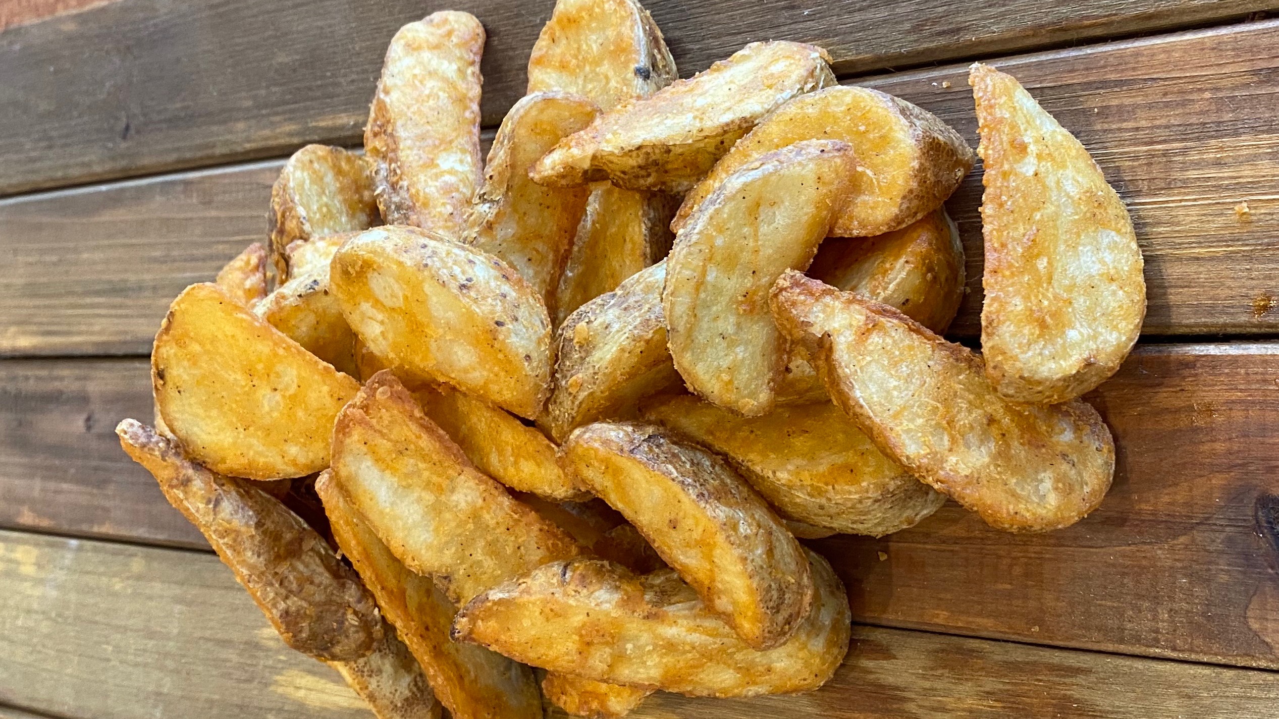 Order Potato Wedges food online from Sizzler store, Downey on bringmethat.com