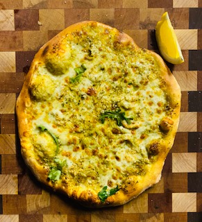 Order Green Garden Pesto Pizza food online from Woodstock Fire Foods store, Meridian on bringmethat.com