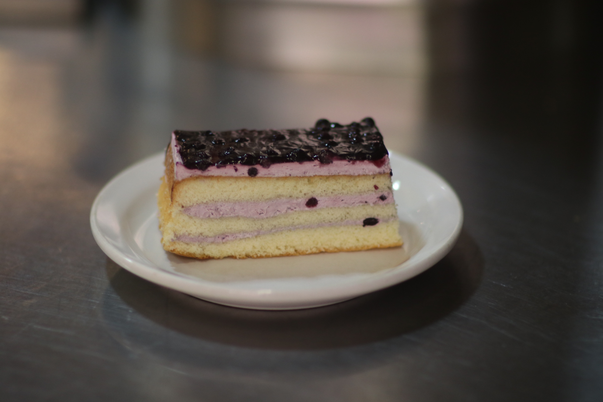 Order Blueberry Cake Slice food online from Tillie's Fine Food & Coffee Company store, Lodi on bringmethat.com