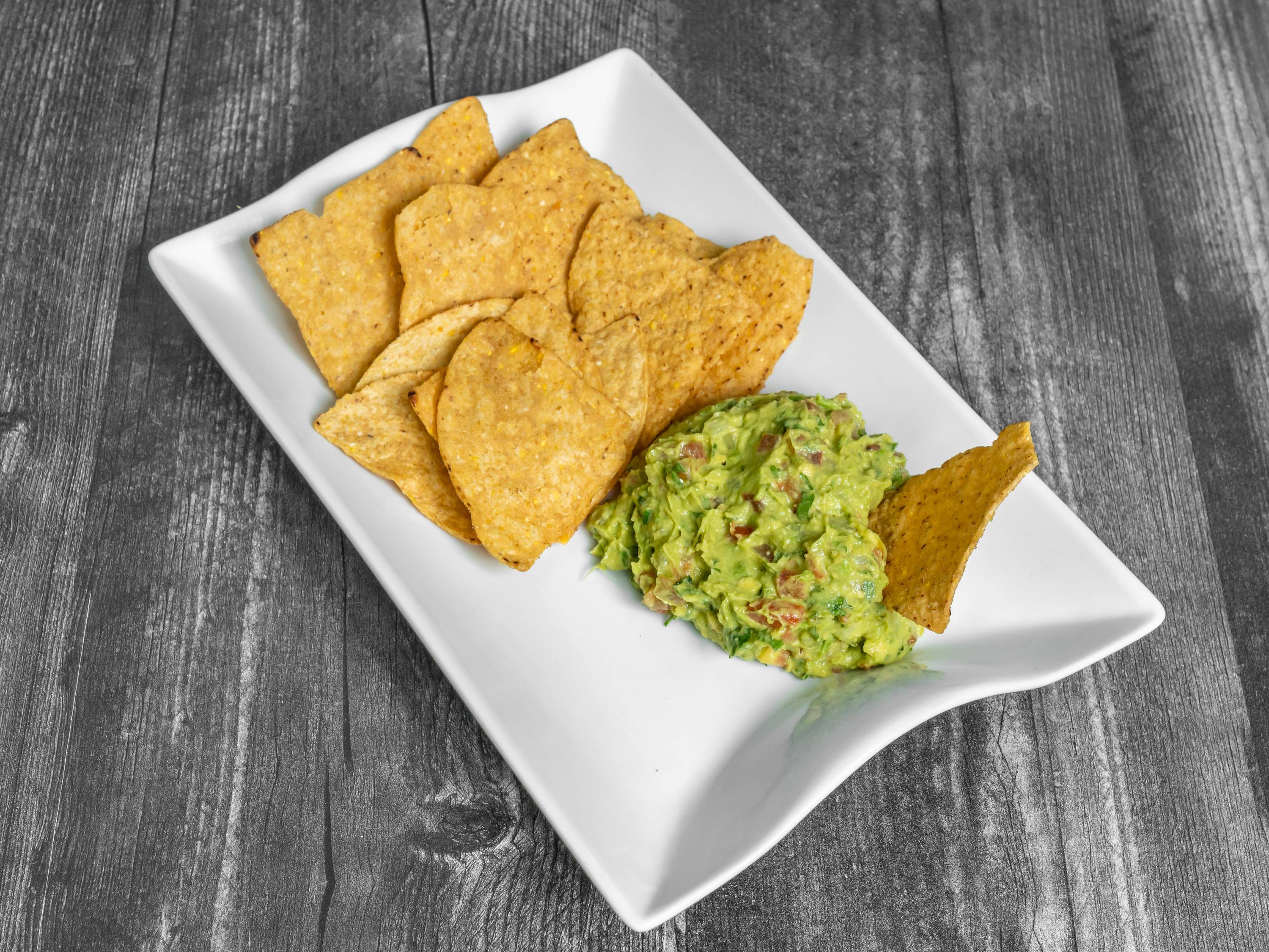 Order Guacamole and Chips food online from Marvins Tacos store, Belvidere on bringmethat.com