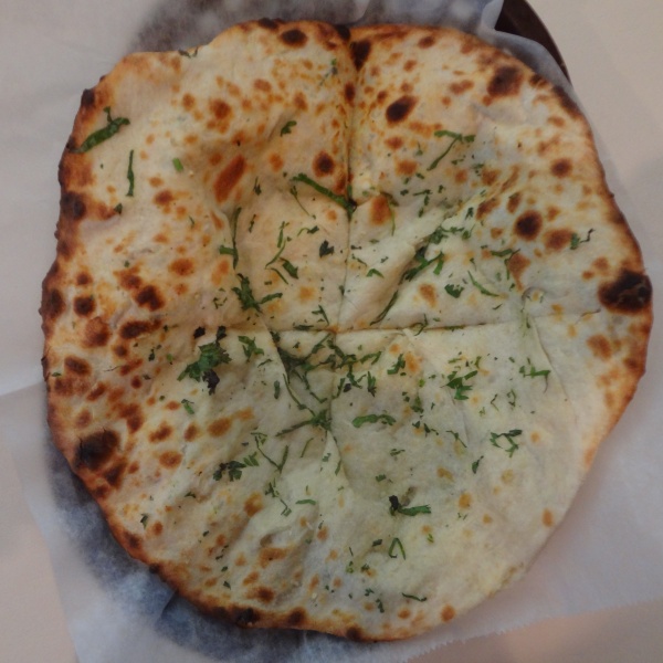 Order Spinach and Cheese Naan food online from Village Tandoor store, Northridge on bringmethat.com