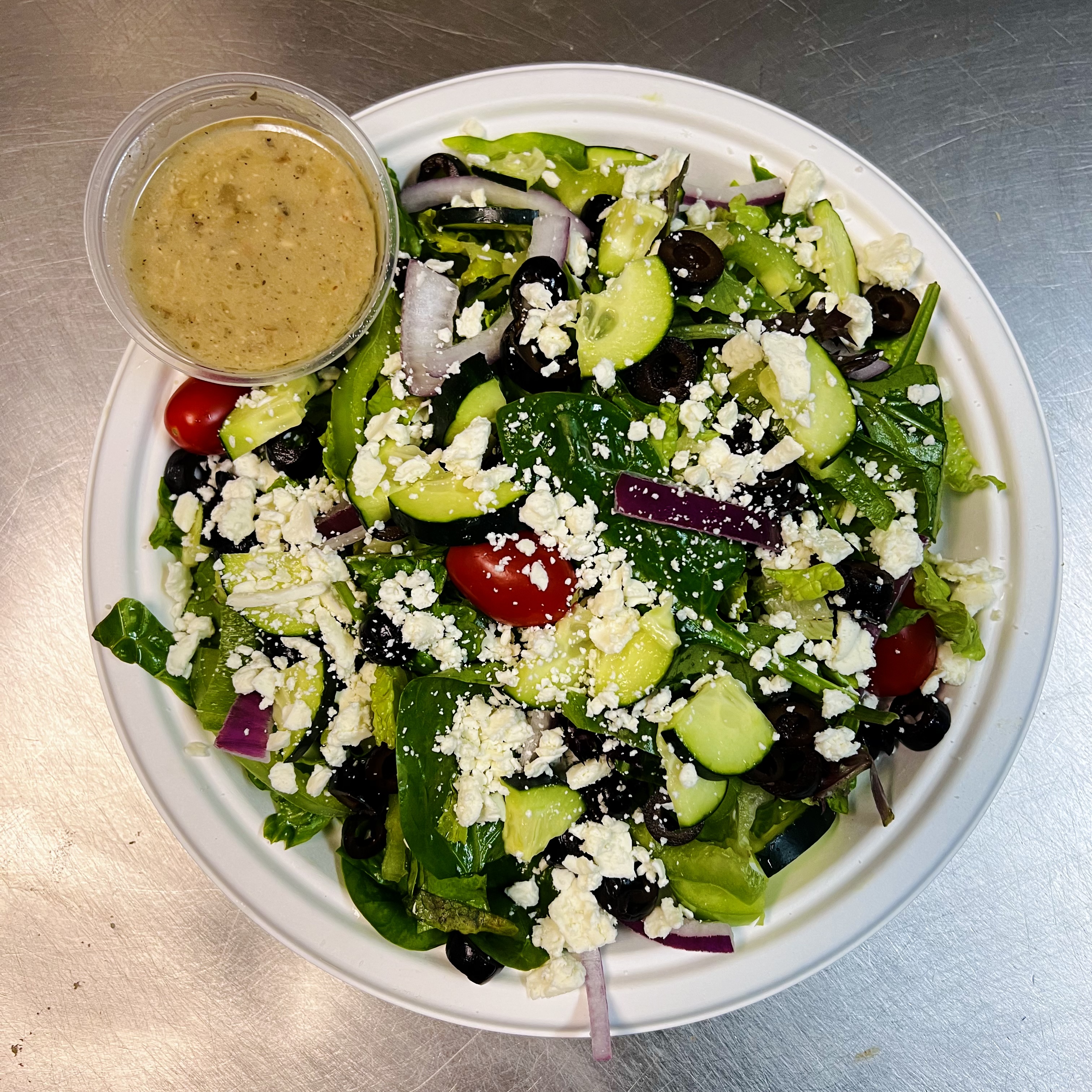 Order Greek Salad food online from Noho Pizza and Grill store, North Hollywood on bringmethat.com