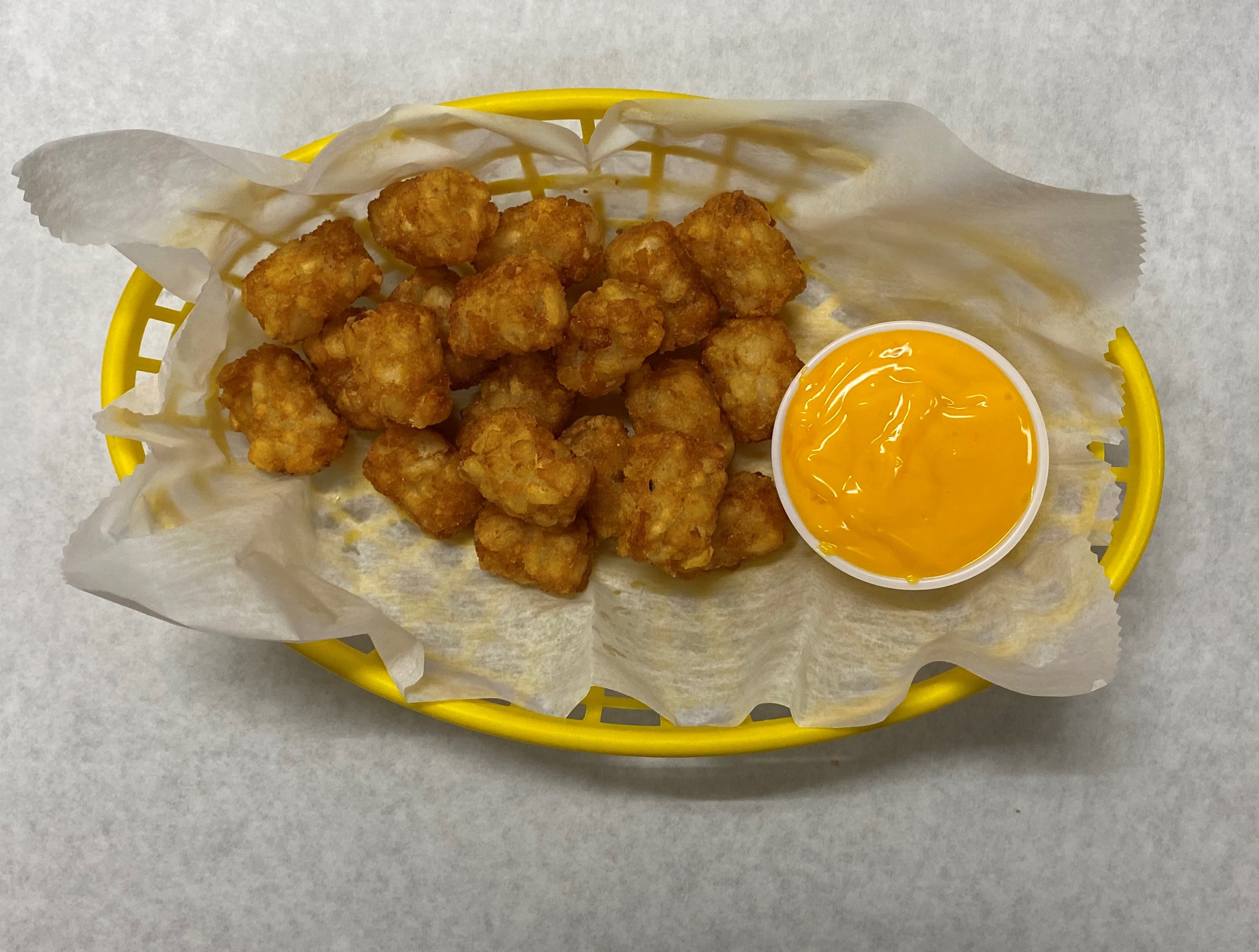 Order Tator Tots with Cheese food online from Mellon Pub store, Mckeesport on bringmethat.com