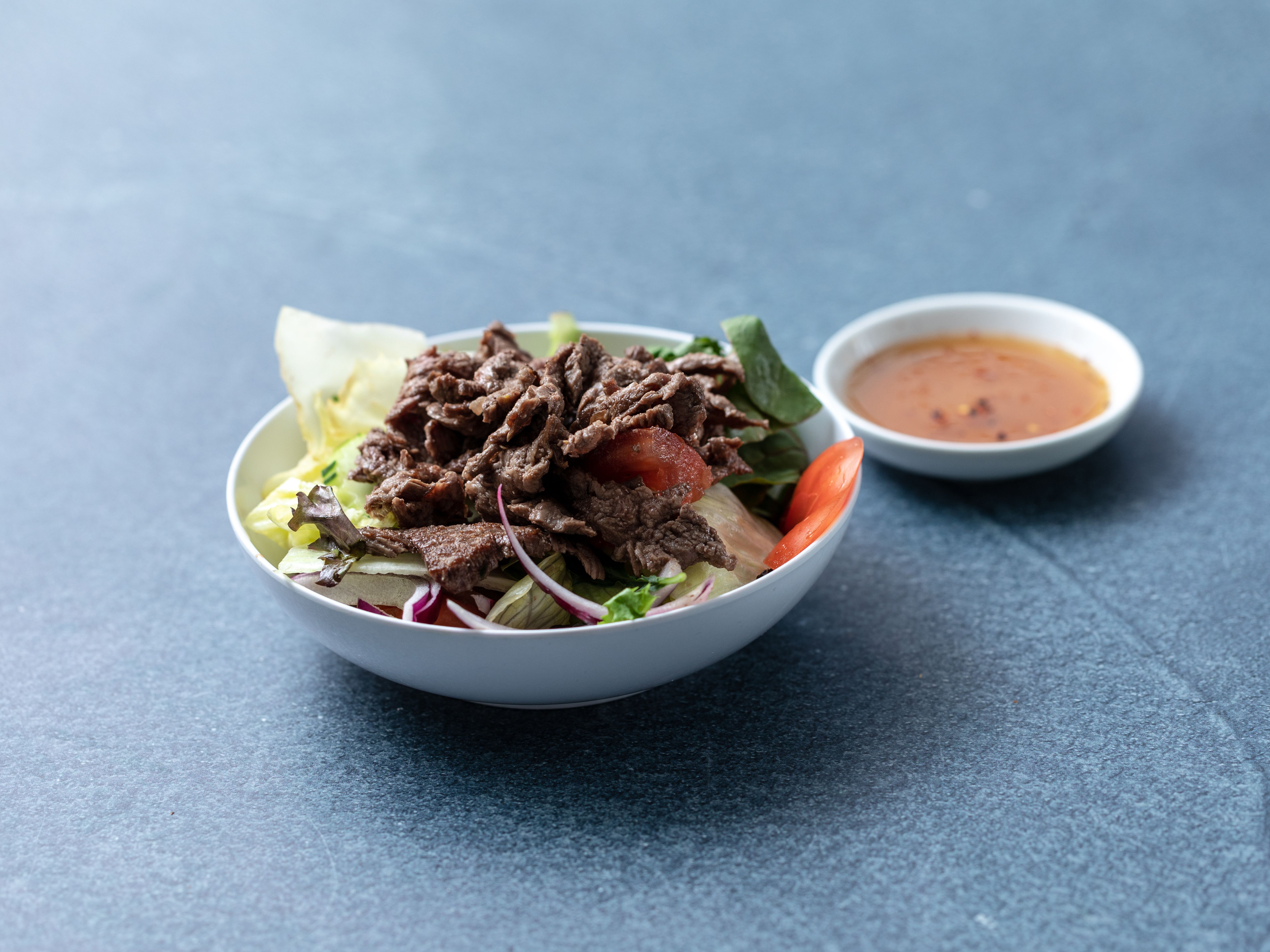 Order Grilled Steak Salad food online from Thai Basil store, Boston on bringmethat.com