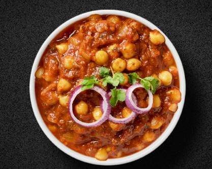 Order Tangy Chickpea Curry food online from Art of Biryani store, San Antonio on bringmethat.com