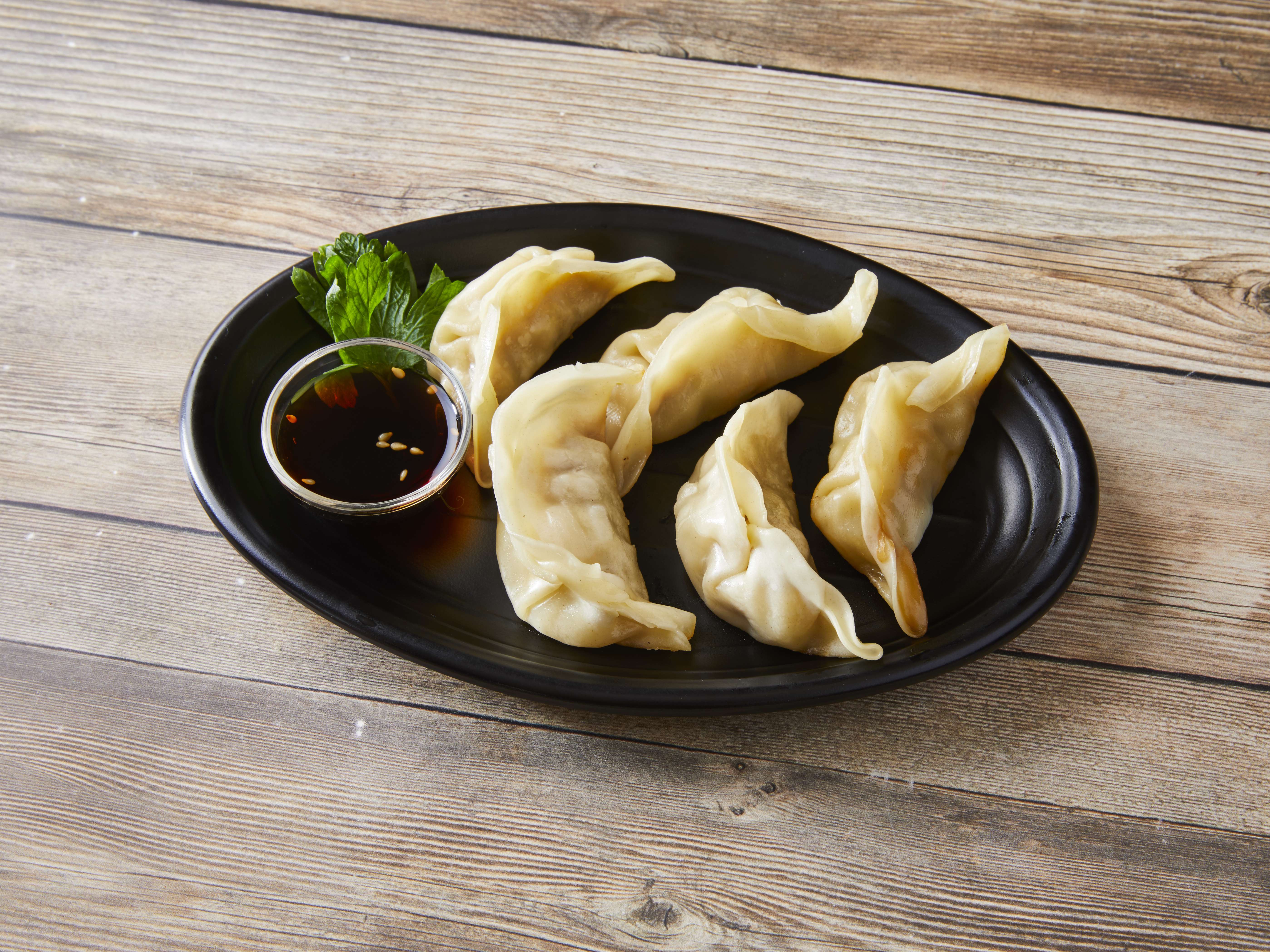 Order Gyoza food online from Dib Sushi Bar and Thai Cuisine store, Chicago on bringmethat.com