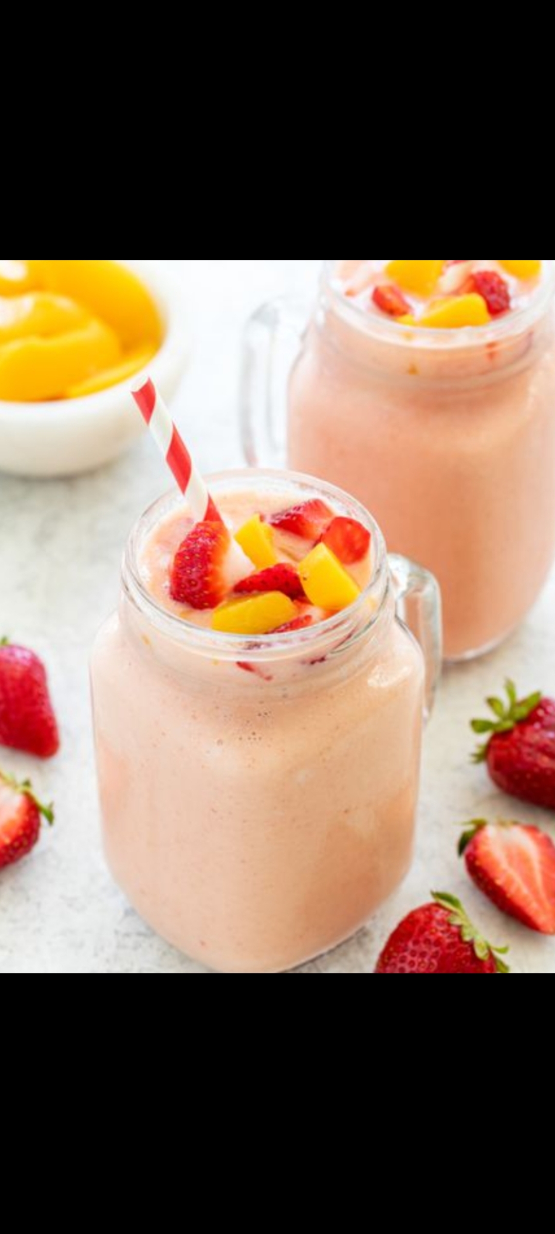 Order Peach Banana Strawberry & Almond Milk Smoothie  food online from American Gourmet Foods Deli store, New York on bringmethat.com