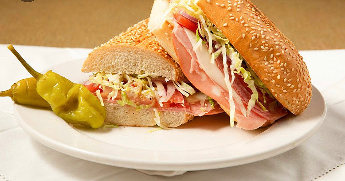 Order Famous Torpedo Sandwich food online from Mona's Italian Restaurant store, San Diego on bringmethat.com