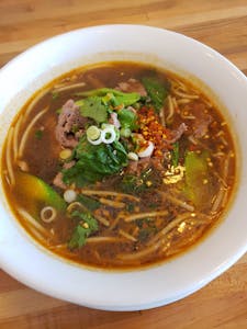 Order Beef Noodle Soup with Meatball food online from Cozy Thai Kc store, Kansas City on bringmethat.com