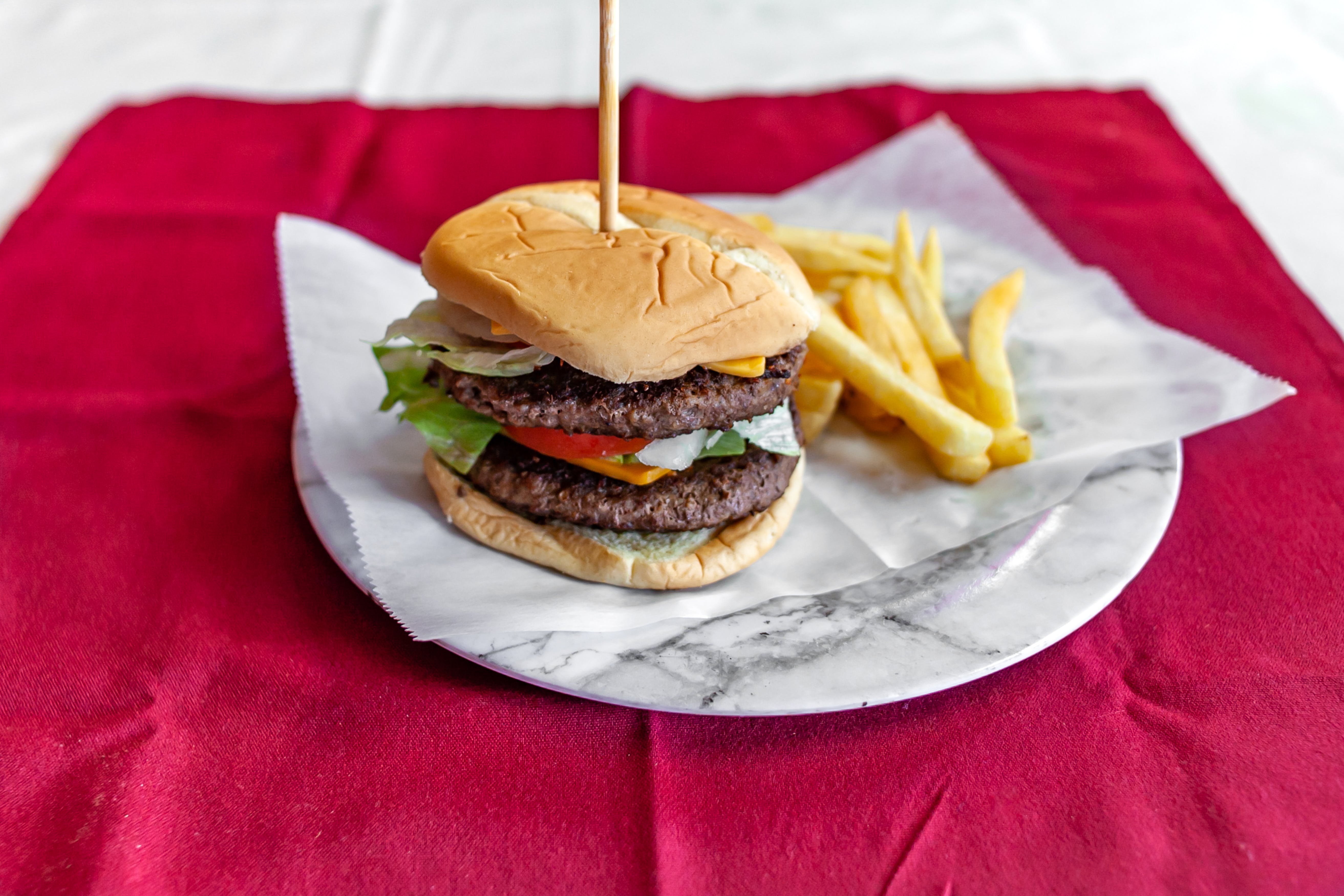 Order Double Cheeseburger - Burger food online from I Love NYC Pizza store, Orlando on bringmethat.com