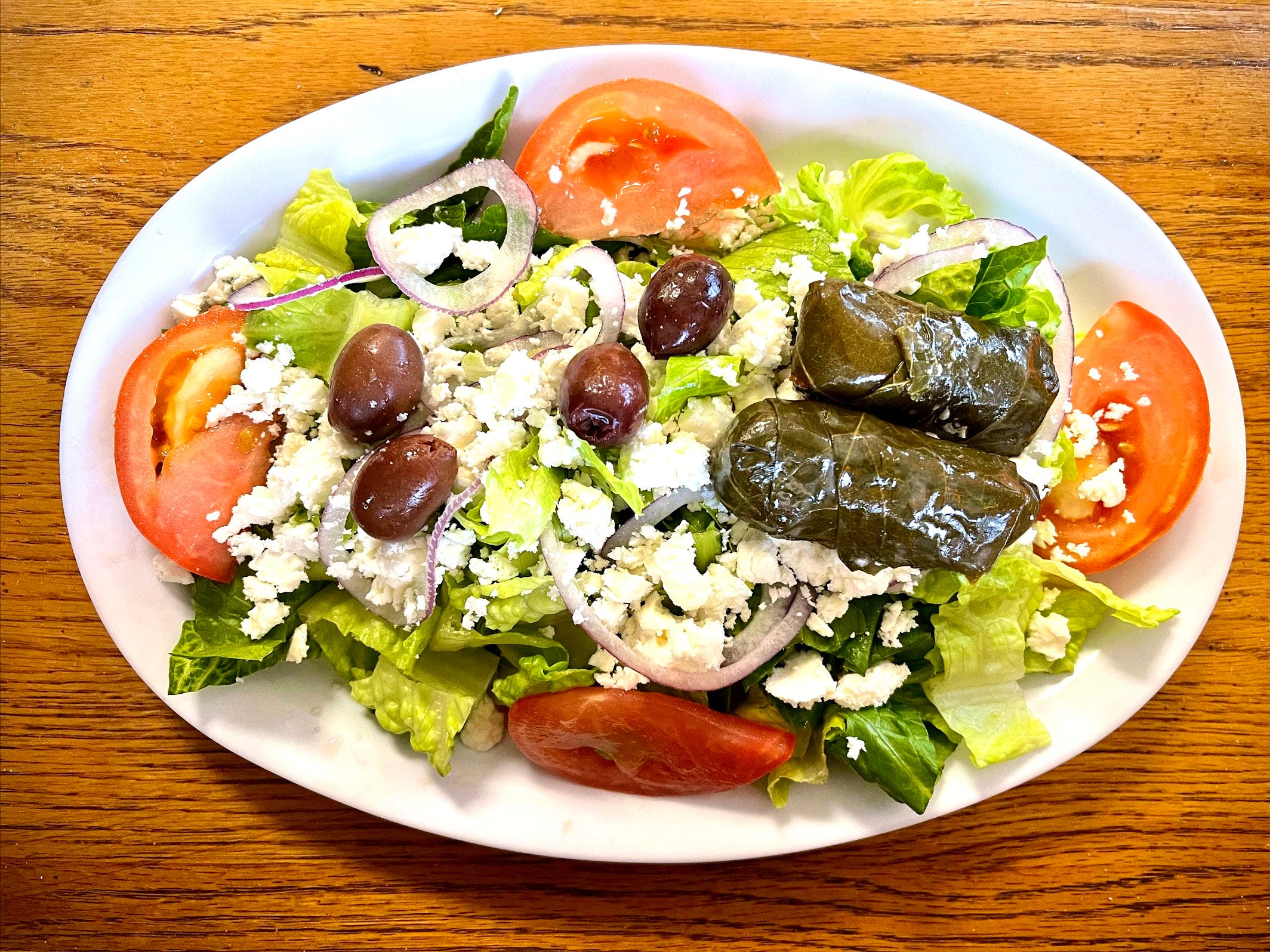 Order Greek Salad - Salad food online from Sonny Restaurant & Pizzeria store, Englewood on bringmethat.com