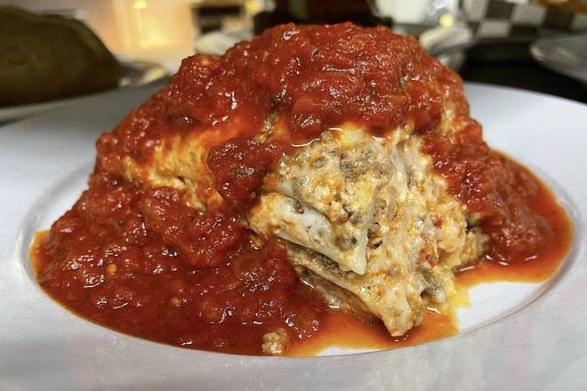 Order Homemade Lasagna food online from Menches Brothers Restaurant and Pub store, Uniontown on bringmethat.com
