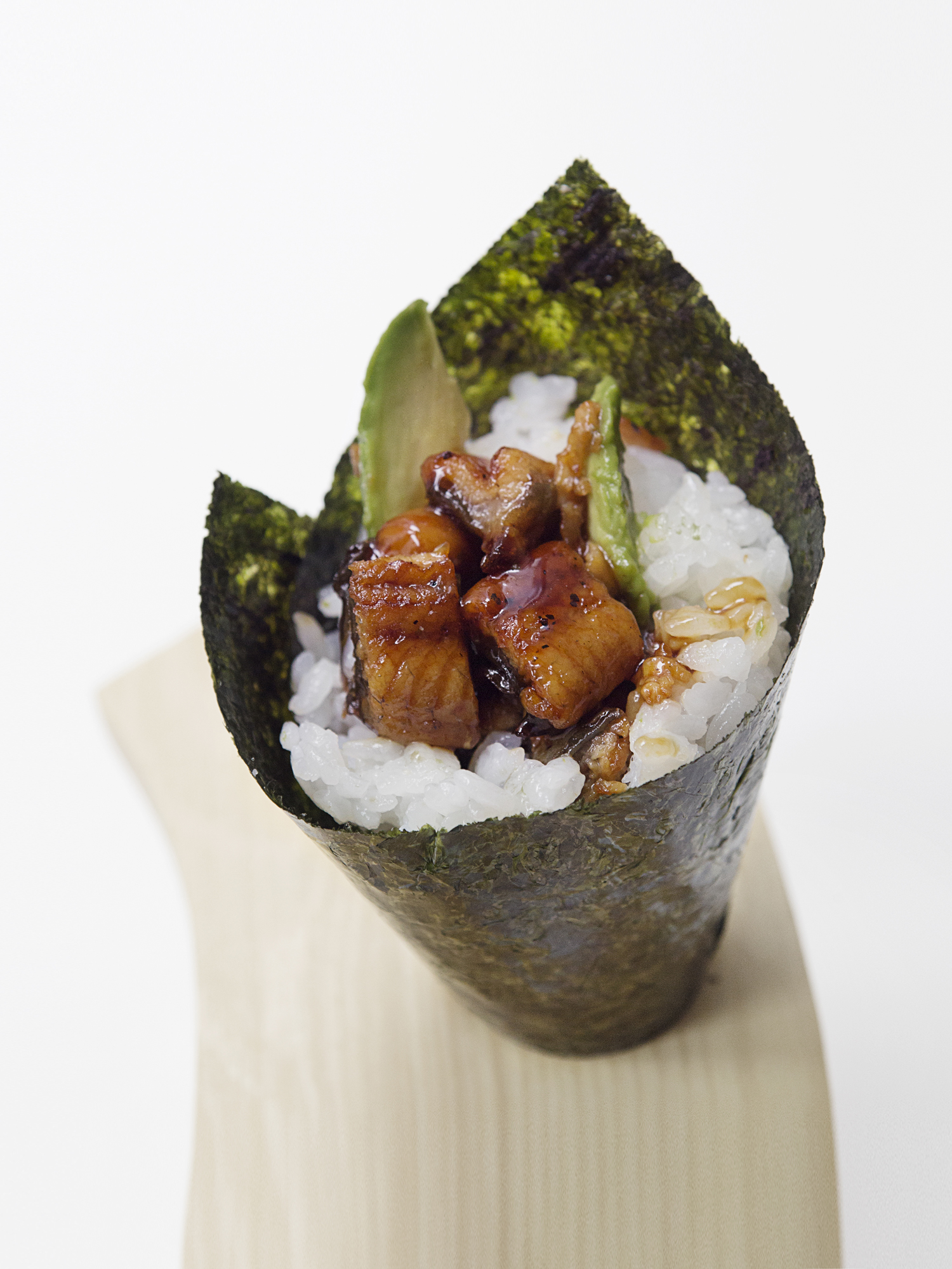 Order Eel Avocado Handroll food online from Aki Sushi store, New York on bringmethat.com