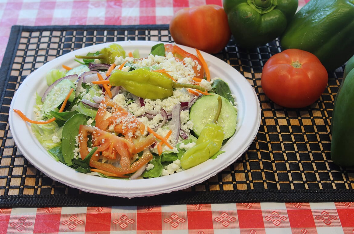 Order Greek Salad food online from Falbo Bros Pizzeria store, Sun Prairie on bringmethat.com