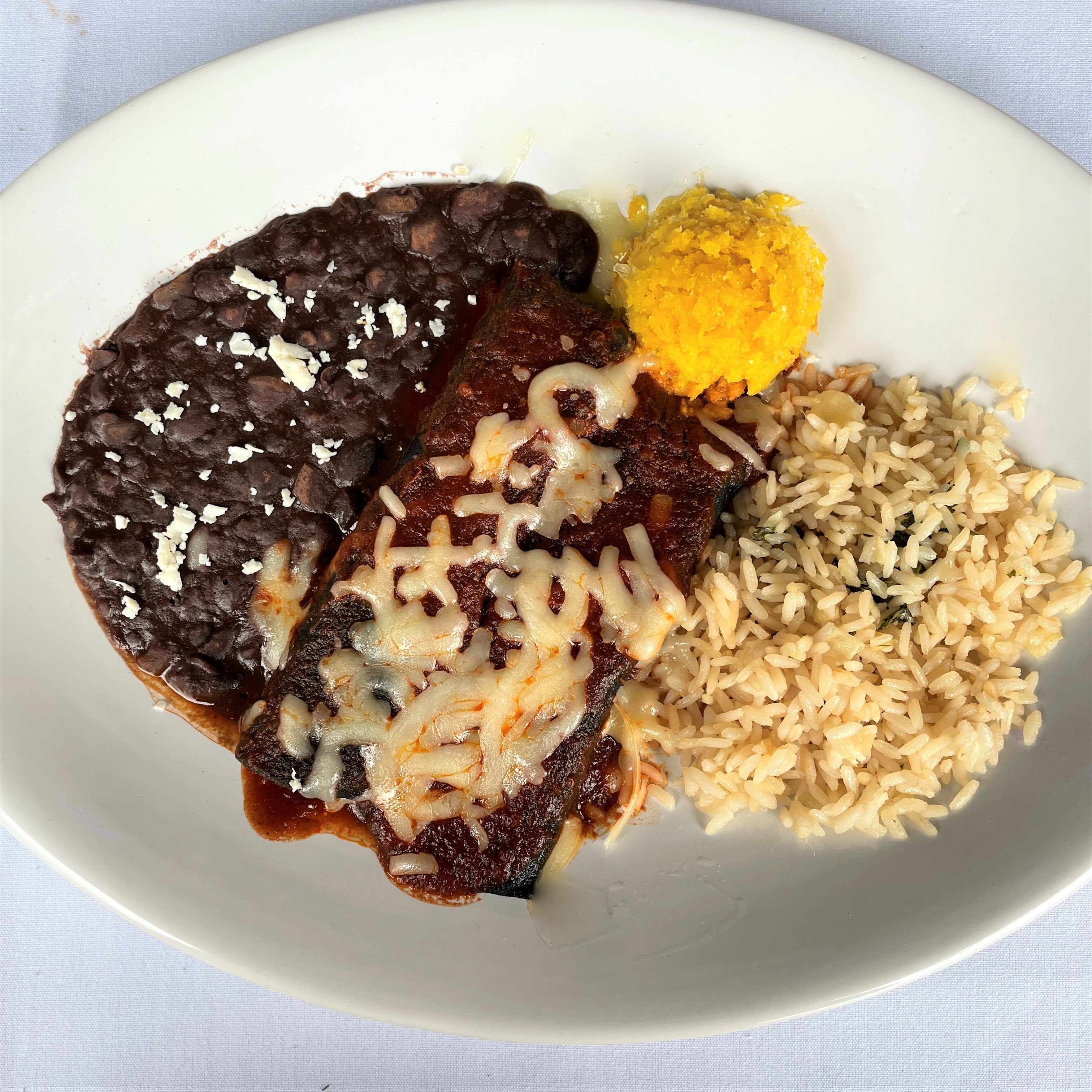 Order BLUE CORN CHEESE ENCHILADA food online from Blue Mesa Grill store, Addison on bringmethat.com