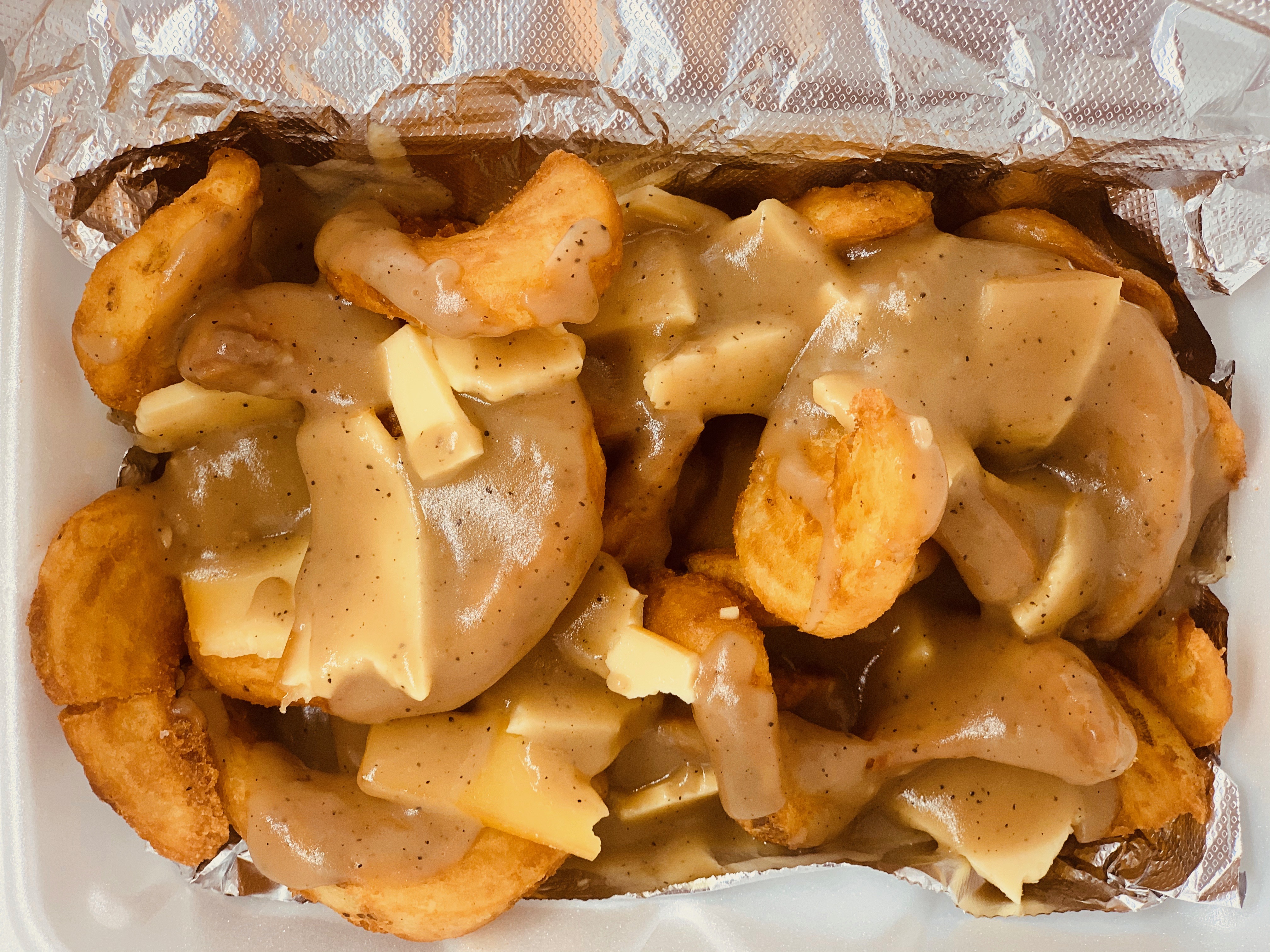 Order Poutine food online from Wicked Marys Chicken store, Ann Arbor on bringmethat.com
