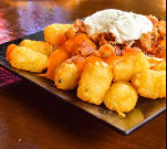 Order Loaded Tots food online from Hero Sports Grill store, Bangor on bringmethat.com