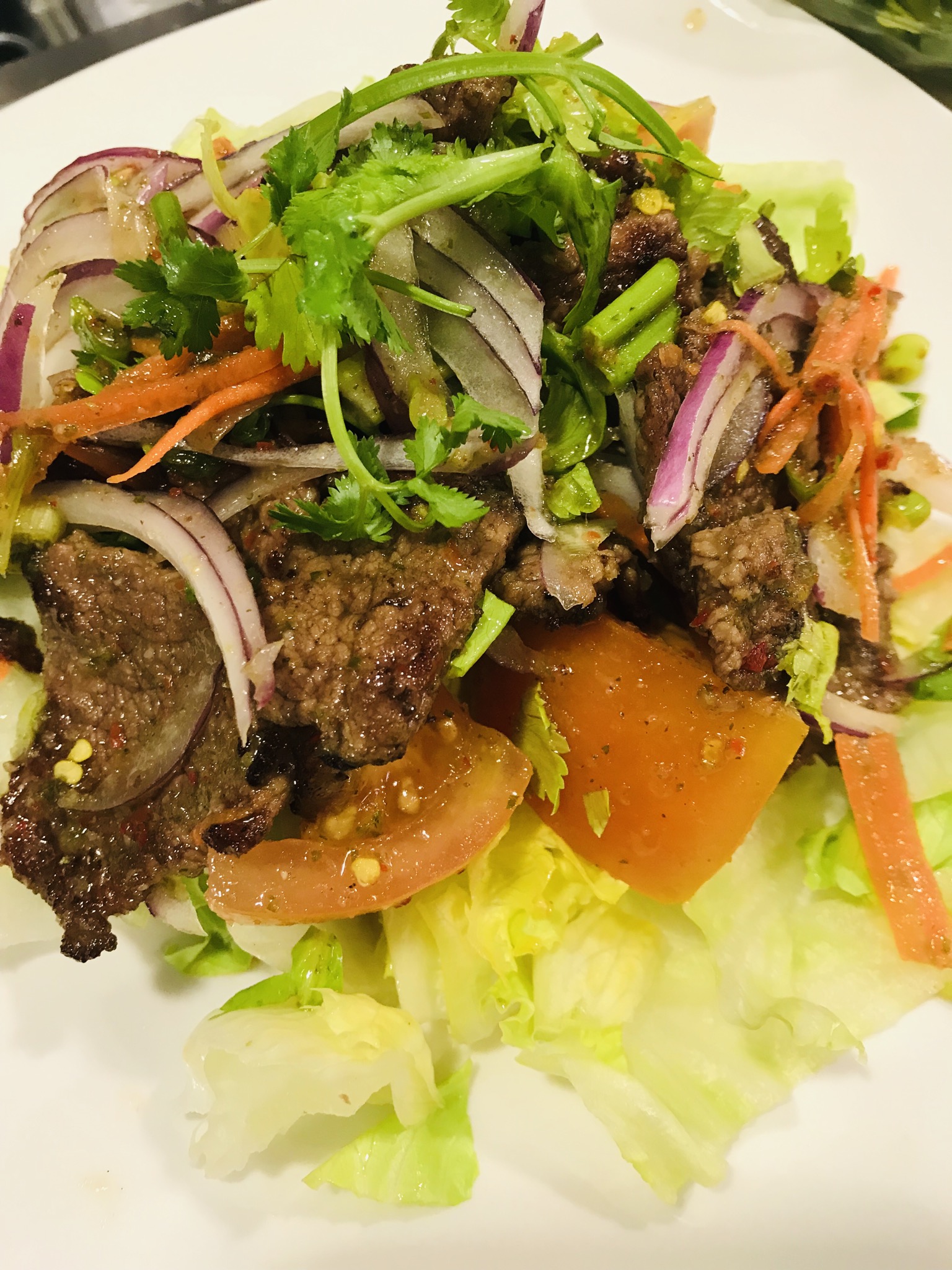 Order 19. Spicy Beef Salad food online from Aromathai Vegan Restaurant store, Santa Clarita on bringmethat.com