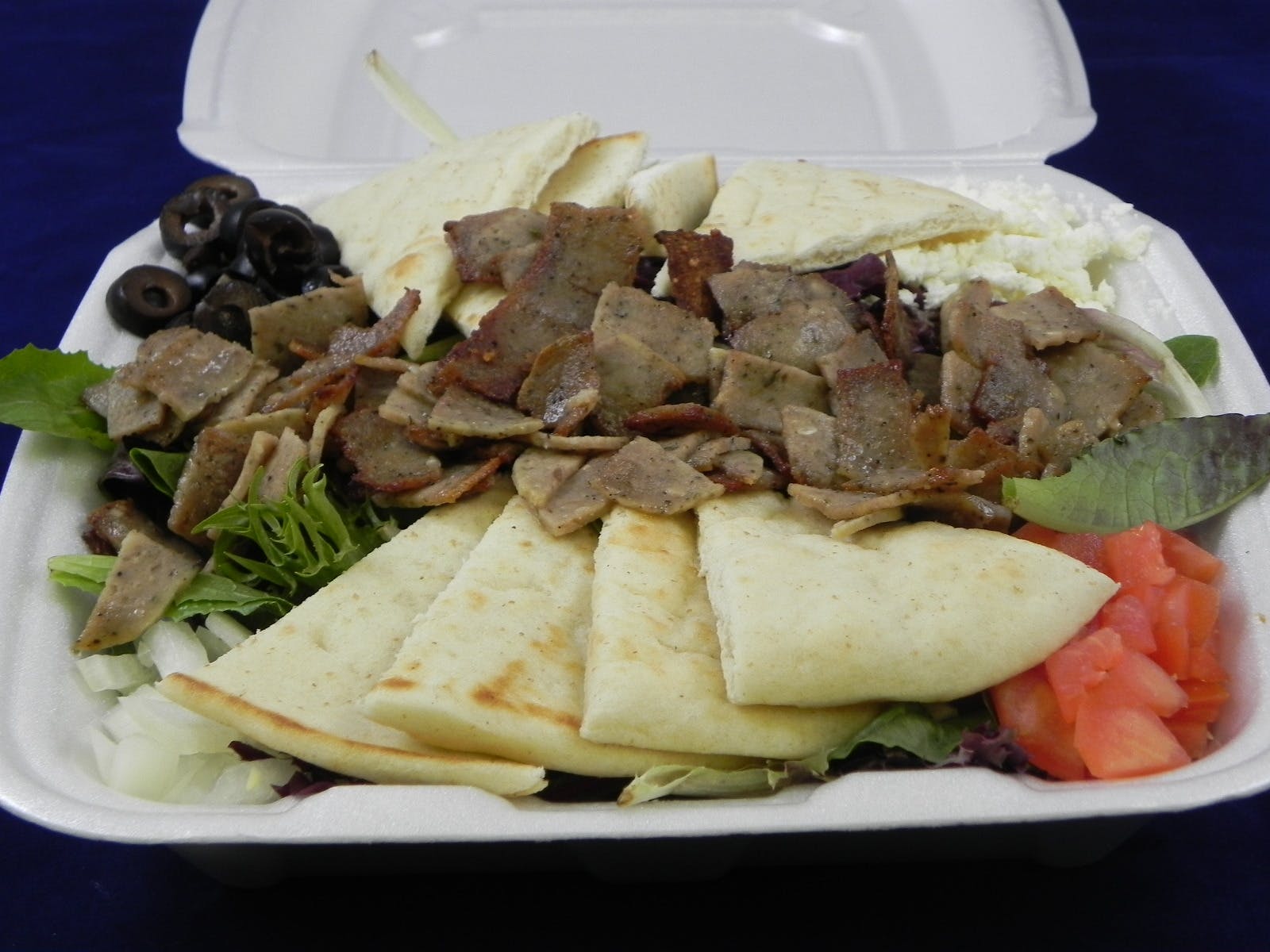 Order Gyro Salad - Salad food online from Tomatoes store, Carnegie on bringmethat.com