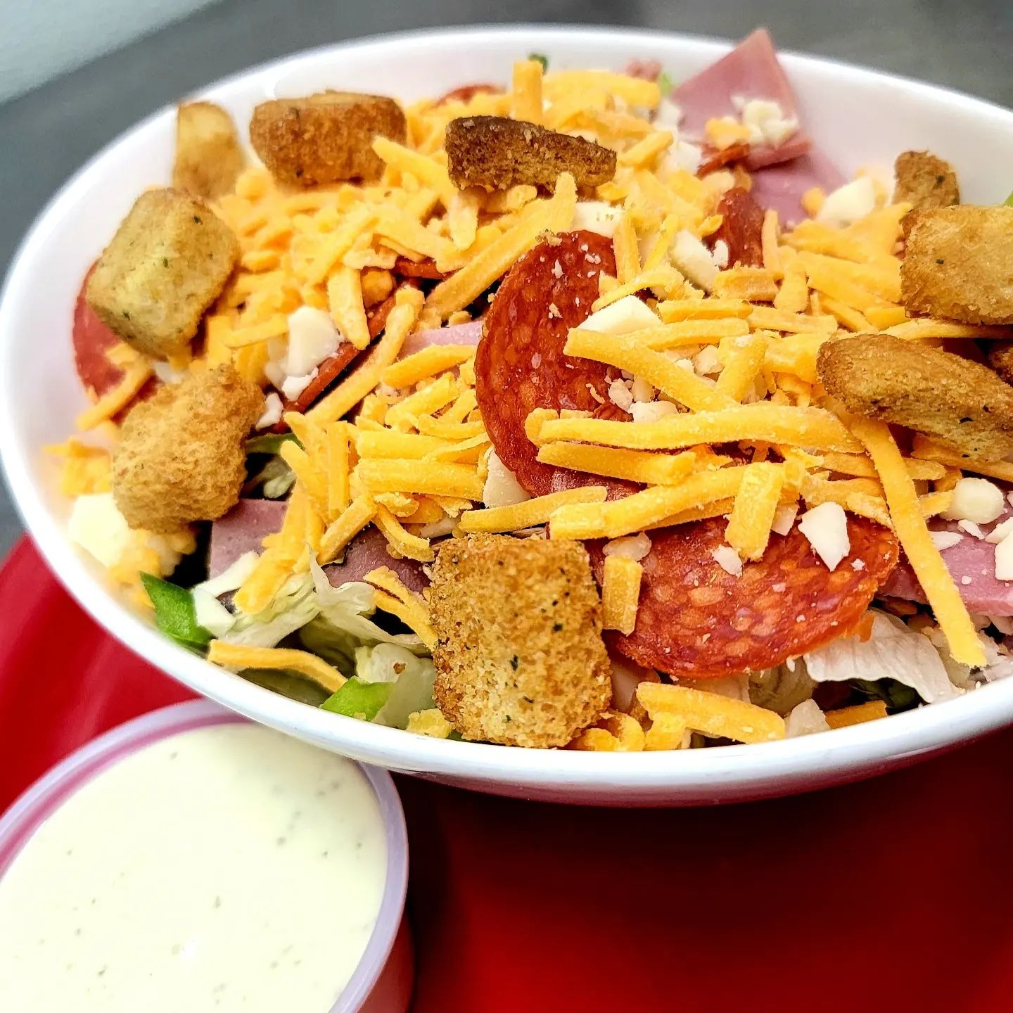 Order Deluxe Salad food online from Pizza Transit store, Niles on bringmethat.com