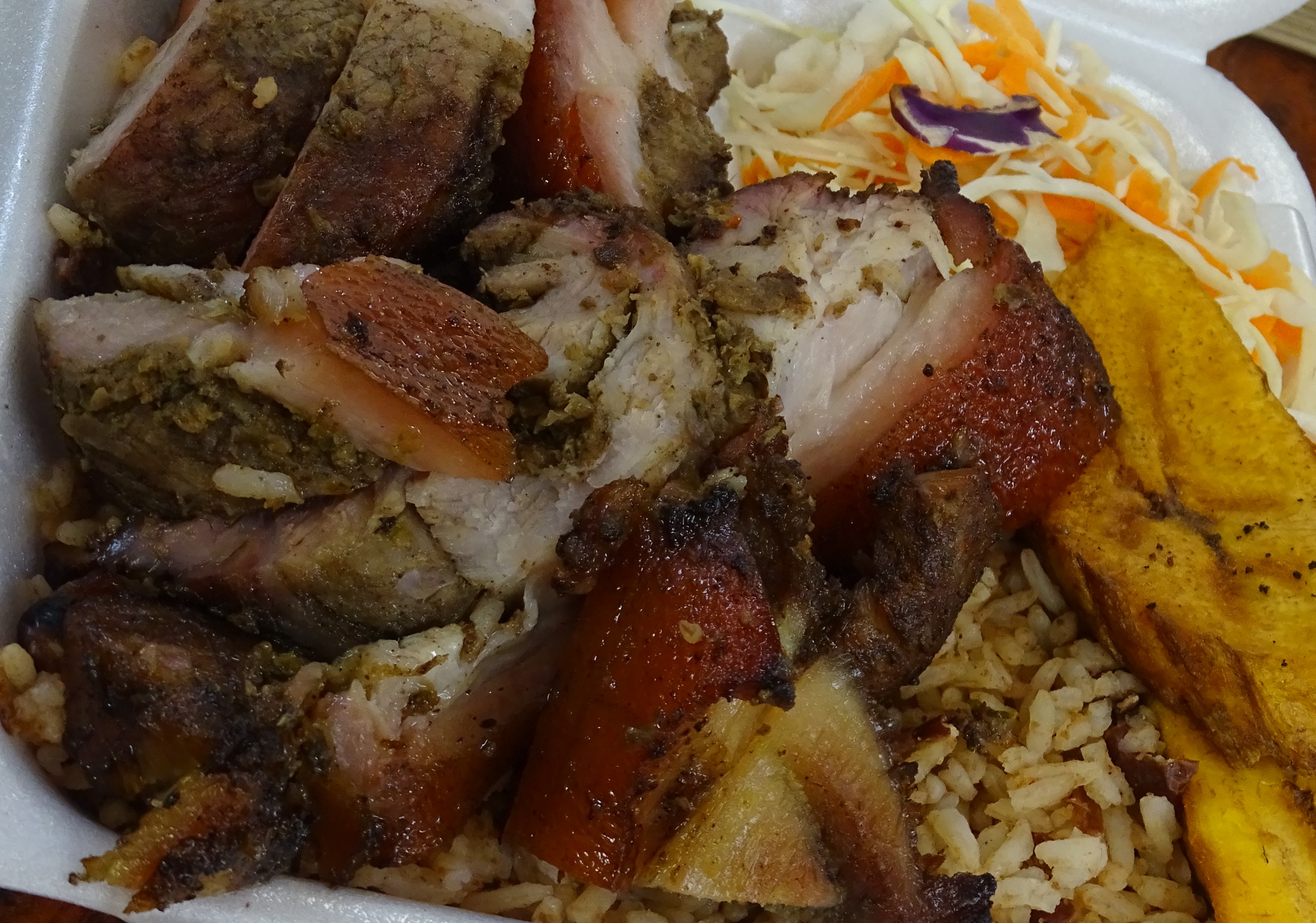 Order Jerk Pork- Tasty  food online from Top Taste Jamaican Restaurant store, Florida City on bringmethat.com