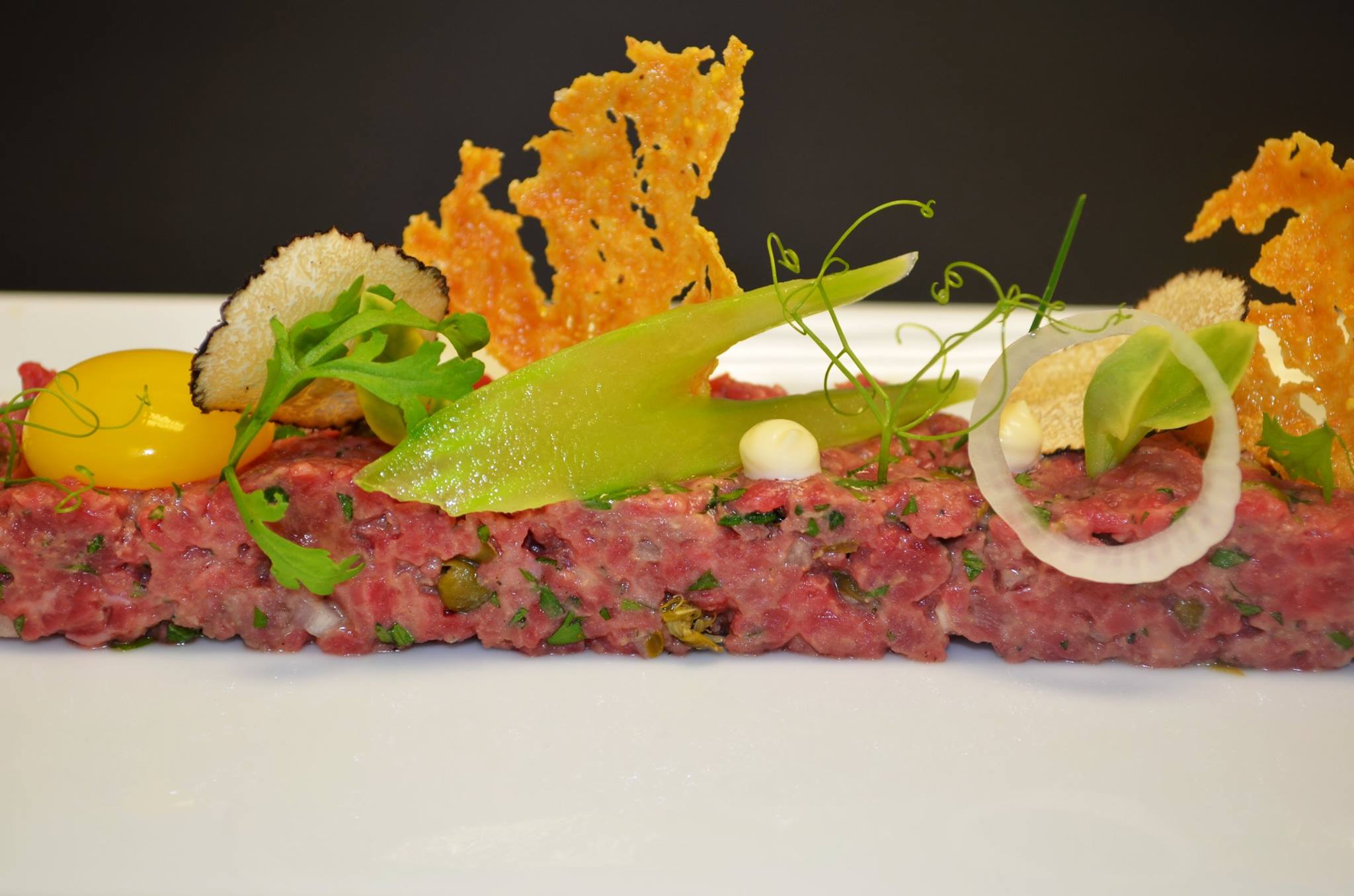Order Beef Tartare food online from Orchids At Palm Court store, Cincinnati on bringmethat.com