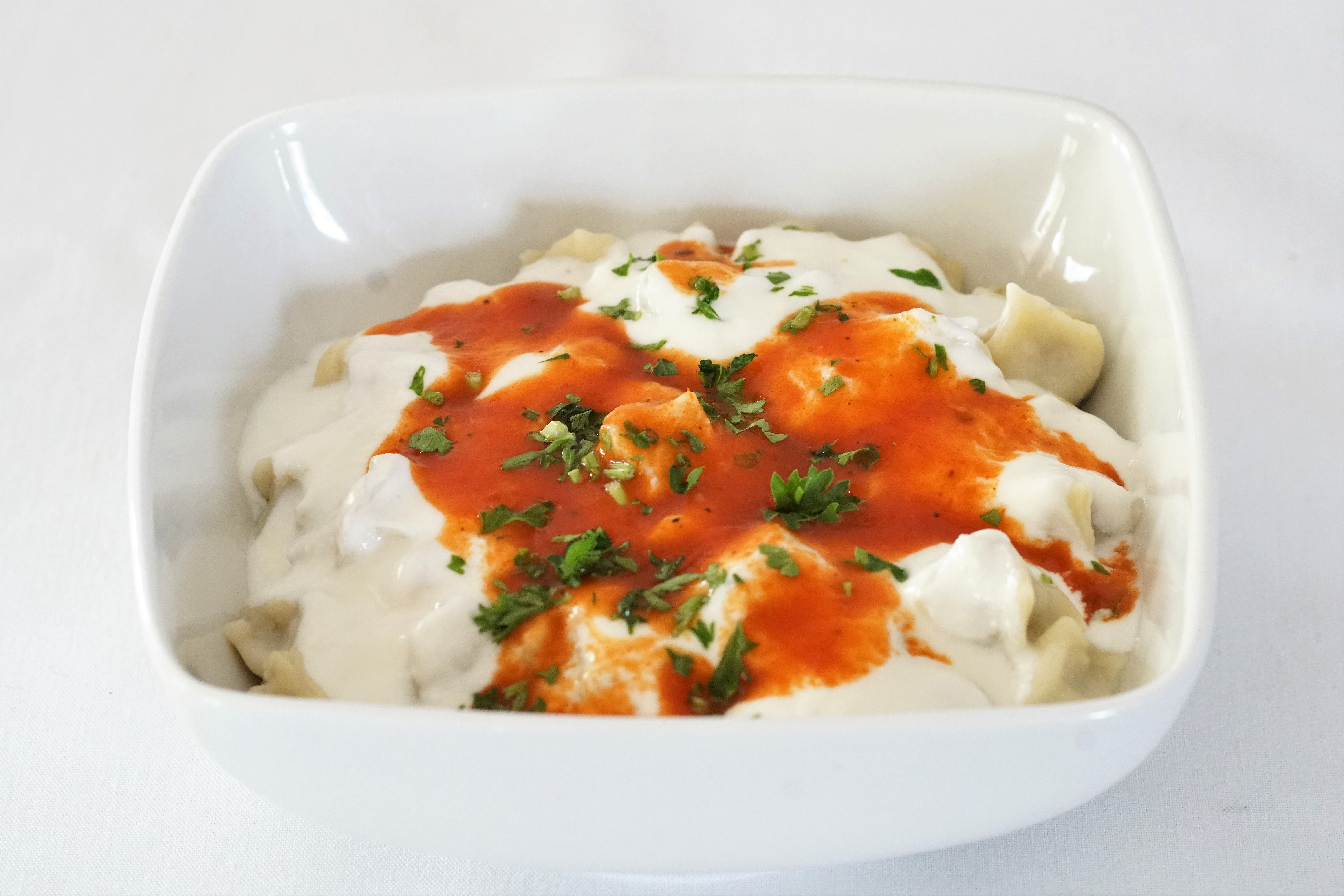 Order Homemade Manti food online from Lezzet Restaurant store, Centreville on bringmethat.com