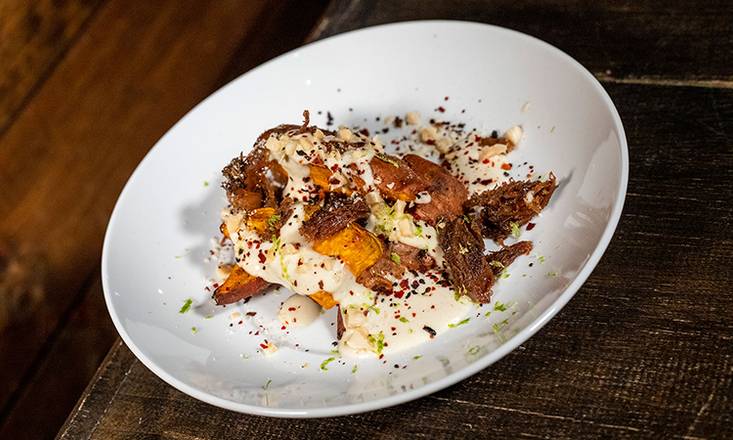 Order Roasted Sweet Potato with Duck Confit food online from Bocado Tapas Wine Bar store, Wellesley on bringmethat.com