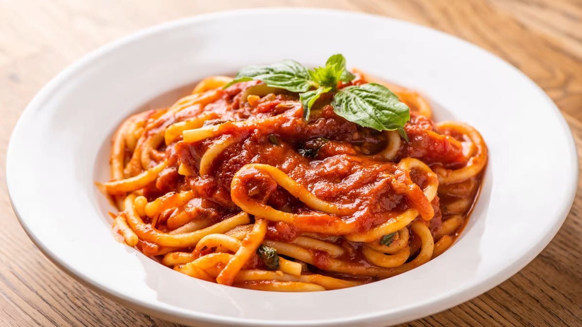 Order Bucatini All Amatricana - Pasta food online from Broccolino Pizza store, Brooklyn on bringmethat.com