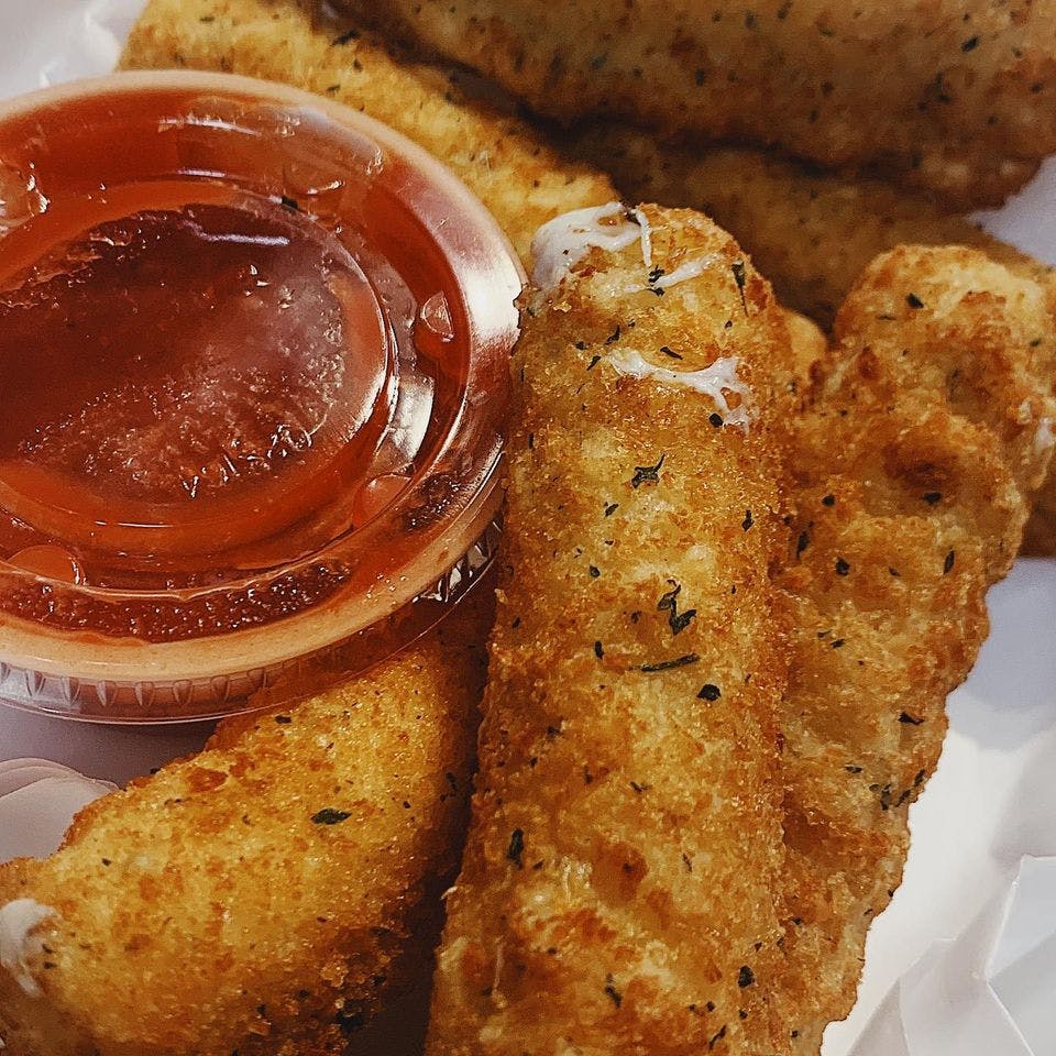 Order Mozzarella Sticks - 6 Pieces food online from Milanos Pizza store, Providence on bringmethat.com