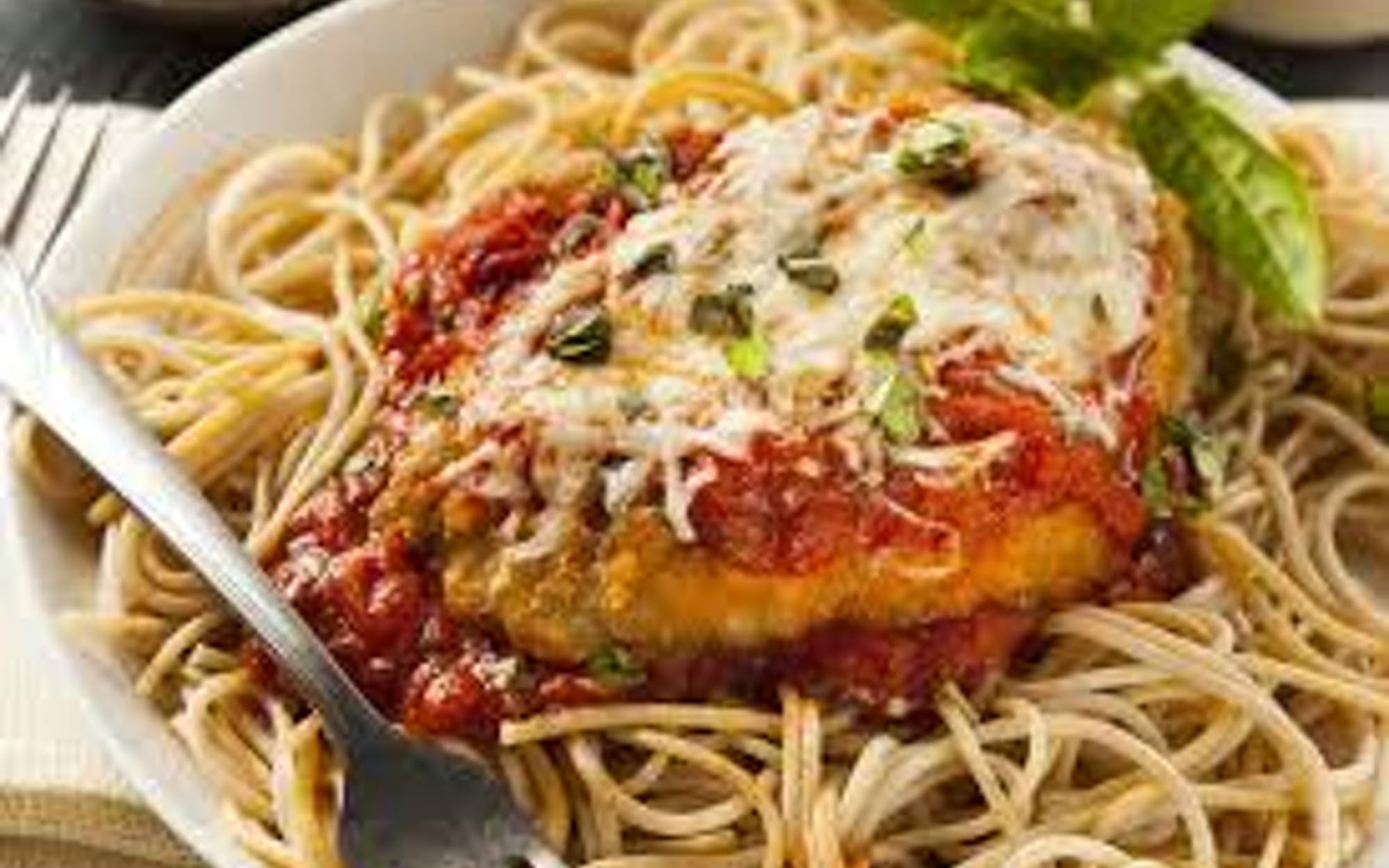 Order Chicken Parmigiana - Entree food online from Pino's Pizzeria store, Easton on bringmethat.com