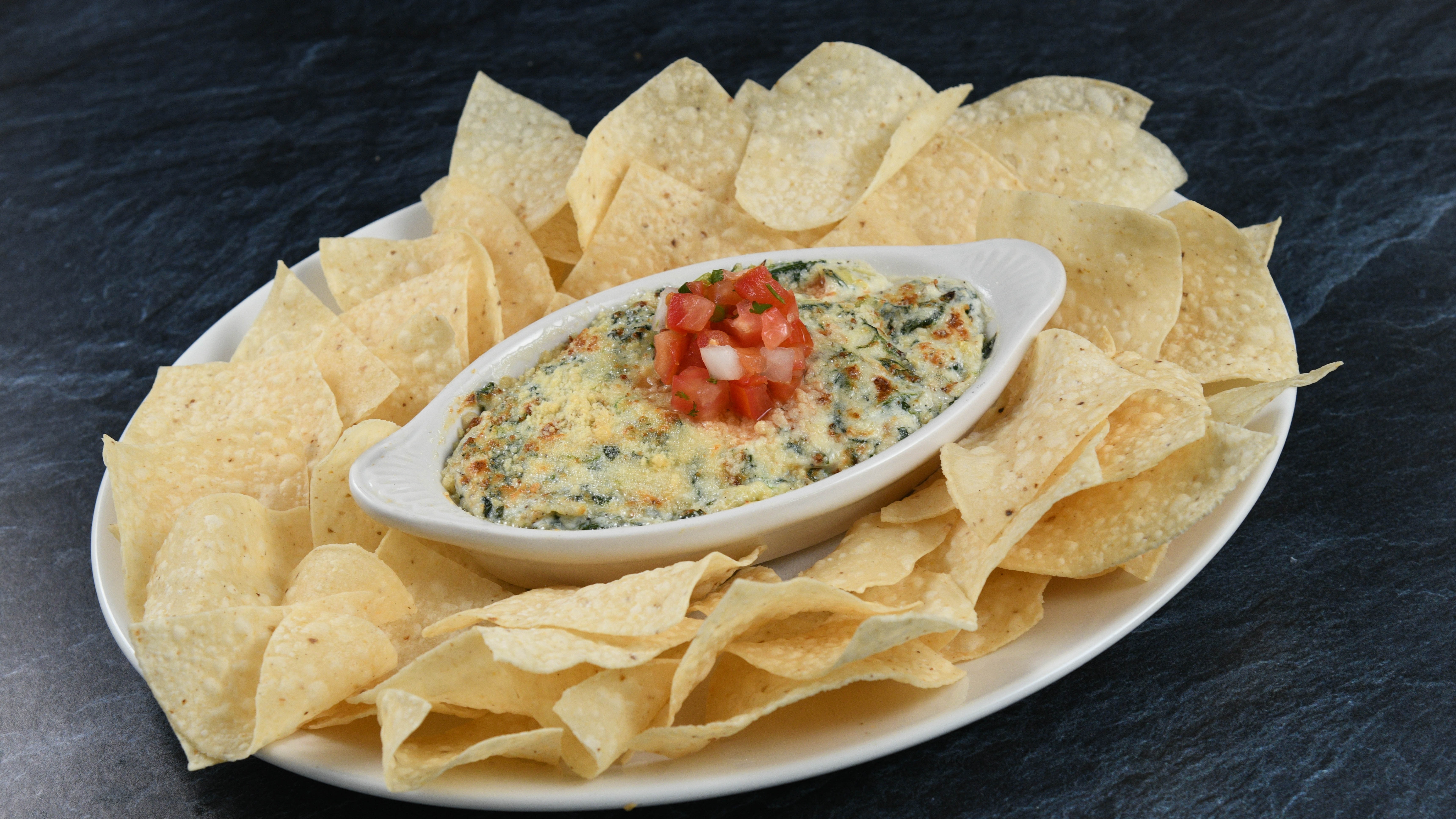 Order Spinach & Artichoke Dip* food online from Rainforest Cafe store, Atlantic City on bringmethat.com