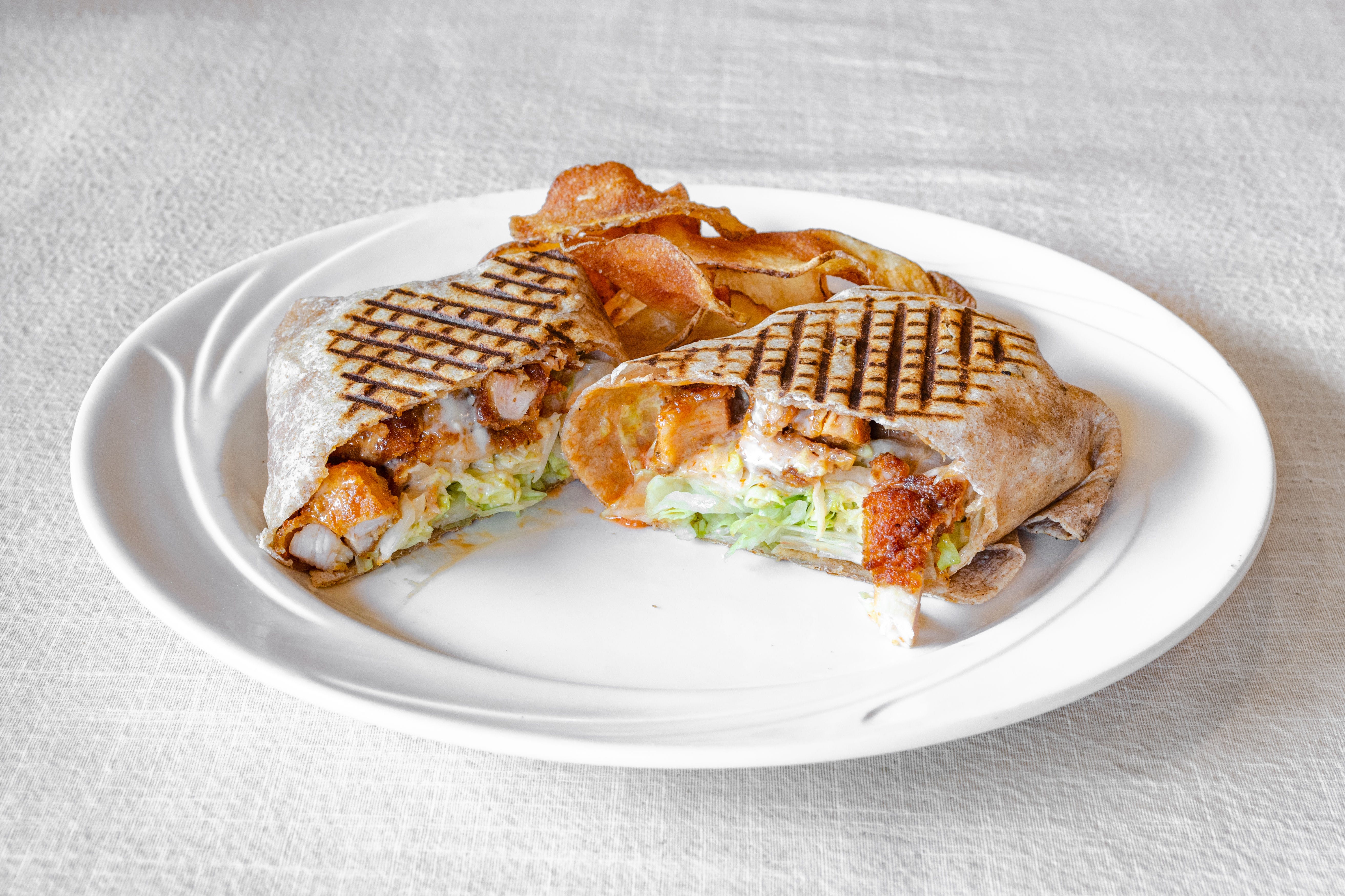 Order Chicken Vodka Wrap Lunch - Wrap food online from Puzo's Family Restaurant store, Ridgewood on bringmethat.com