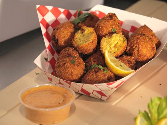 Order Hush Puppies food online from Captain Sam Fish & Chicken store, San Diego on bringmethat.com