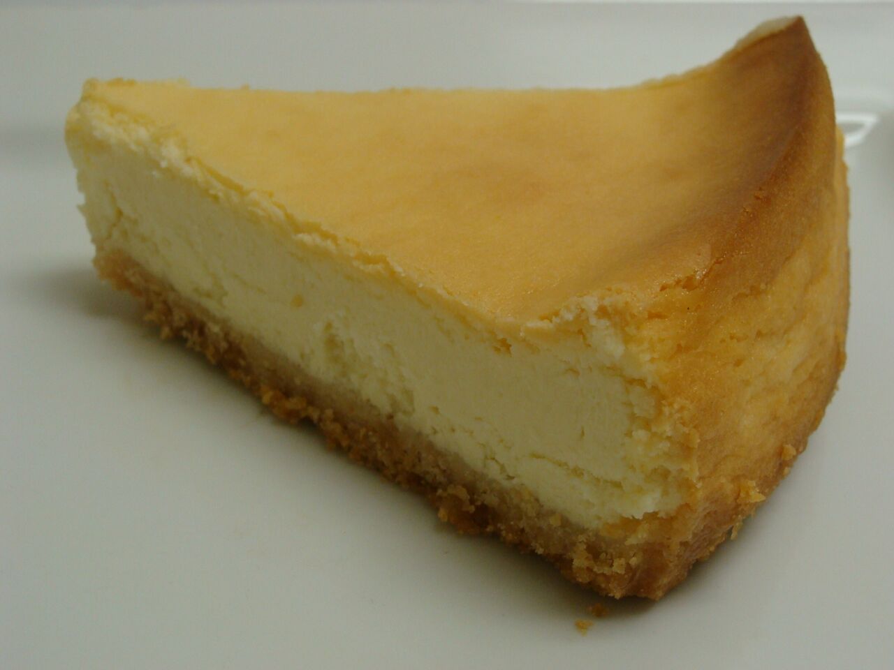 Order New York Style Cheesecake food online from Cosmic Cookie Bakery store, Charlotte on bringmethat.com