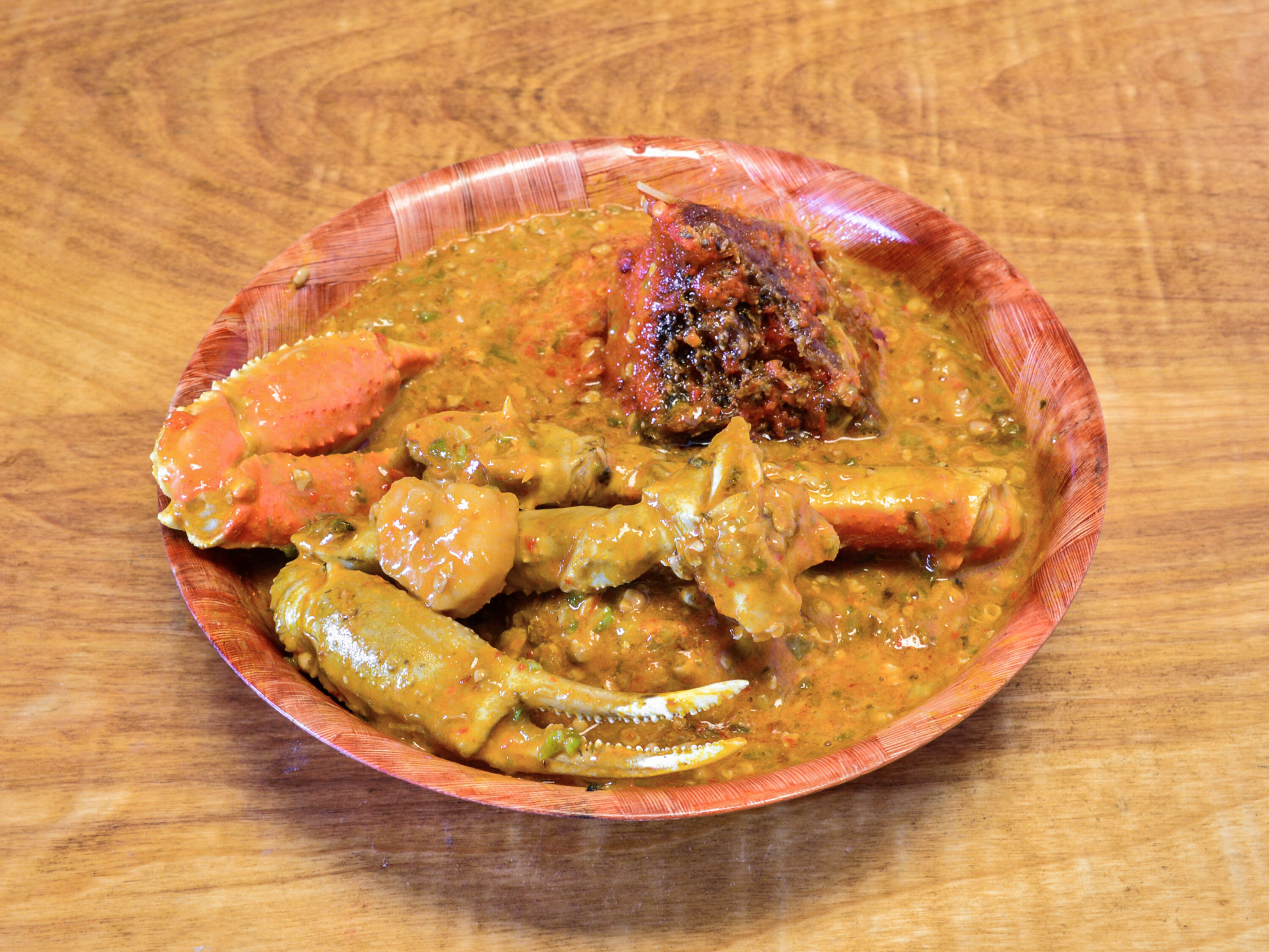 Order Seafood Okra Soup food online from The Jollof Buka store, Indianapolis on bringmethat.com