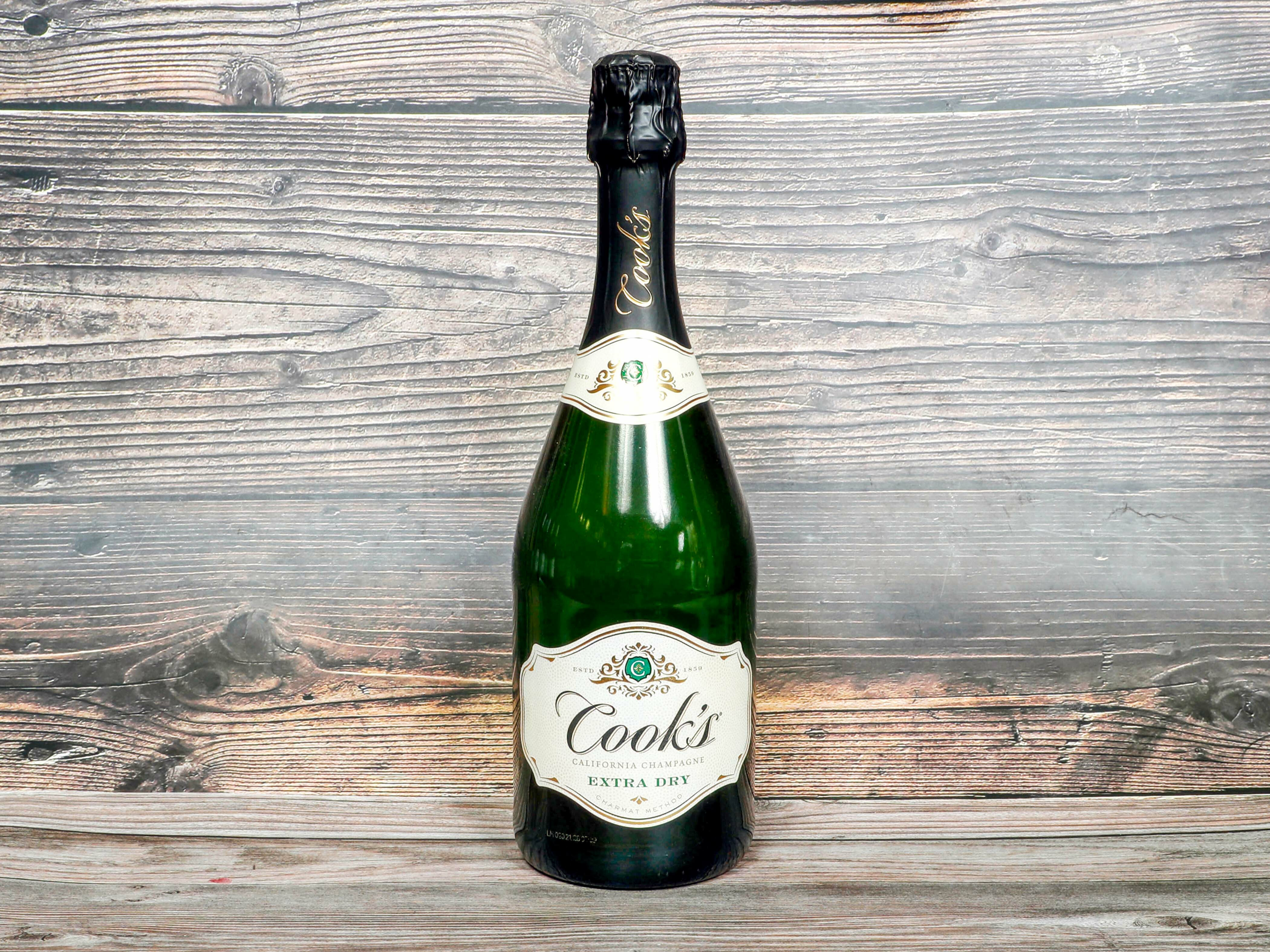 Order 750 ml. Cook's Extra Dry Champagne food online from Brothers Royal Crown Minimart store, Atwater on bringmethat.com