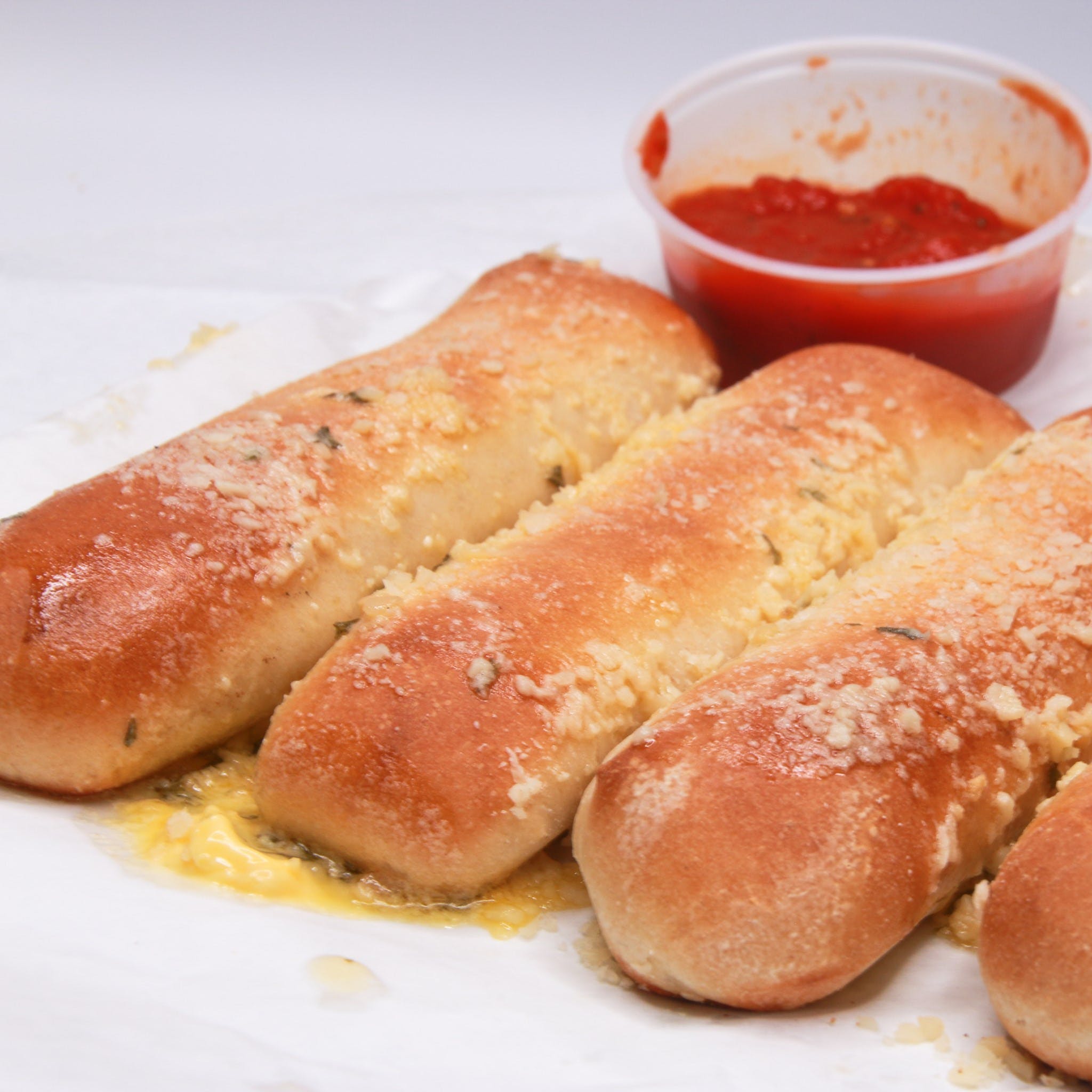 Order Pepperoni Roll - Appetizer food online from Pizza Cravin store, Norwalk on bringmethat.com