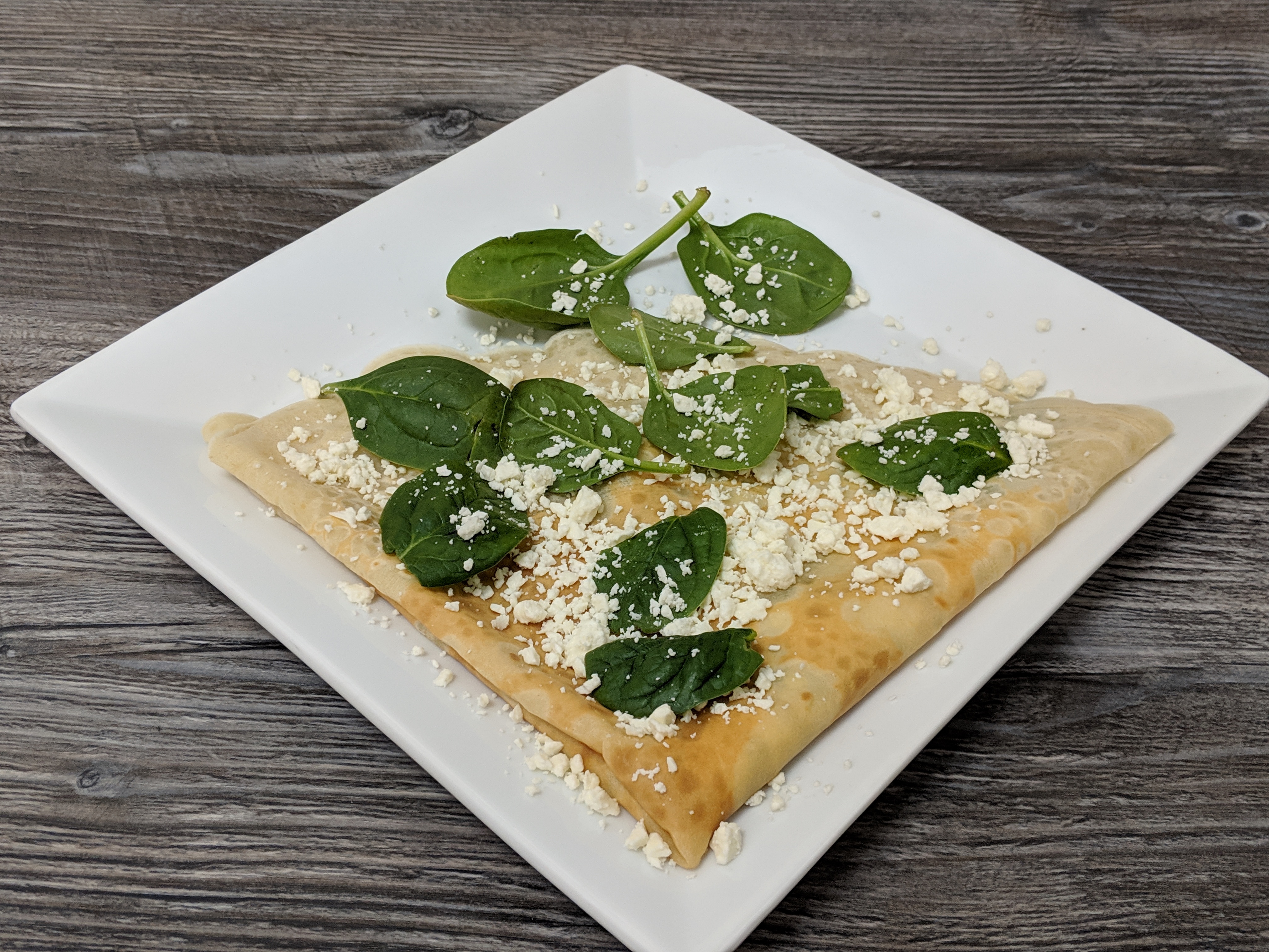 Order Feta Cheese and Spinach Crepe food online from Paradise Cafe store, Kalamazoo on bringmethat.com