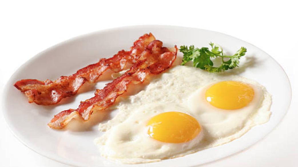 Order Eggs with Side of Bacon Plate food online from Tipico's store, Dallas on bringmethat.com
