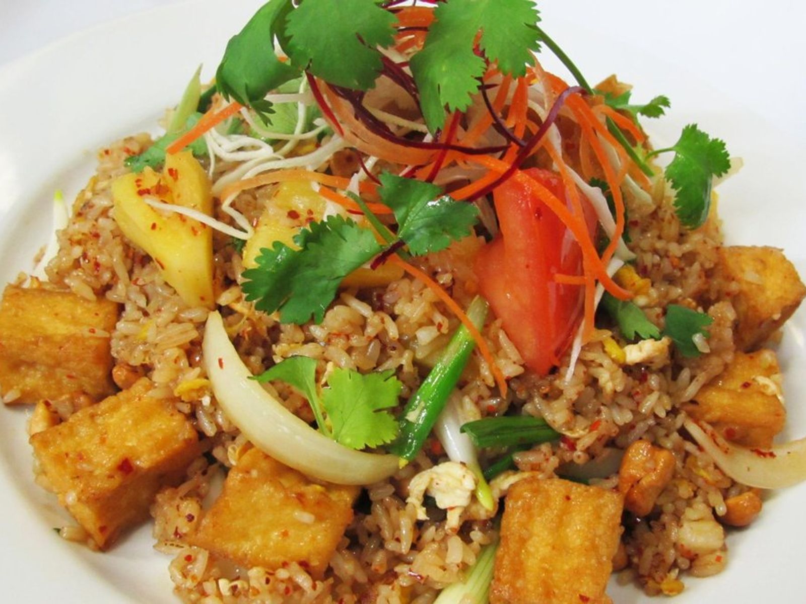 Order PINEAPPLE FRIED RICE food online from Pinto Urban Thai Diner store, Richardson on bringmethat.com