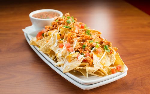 Order Buffalo Chicken Nachos - Appetizer food online from Native Grill & Wings store, Laveen Village on bringmethat.com