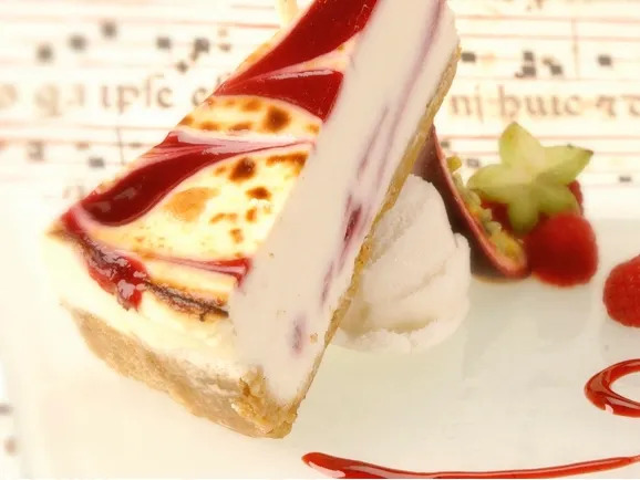 Order White Chocolate Raspberry Cheesecake food online from Houseofbread store, Denver on bringmethat.com