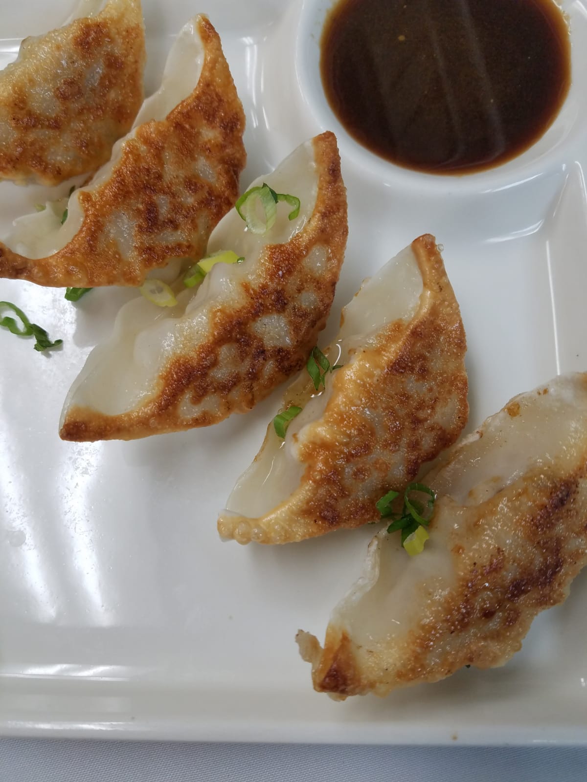 Order Pork and Scallions Dumplings food online from Thom Thom store, Wantagh on bringmethat.com