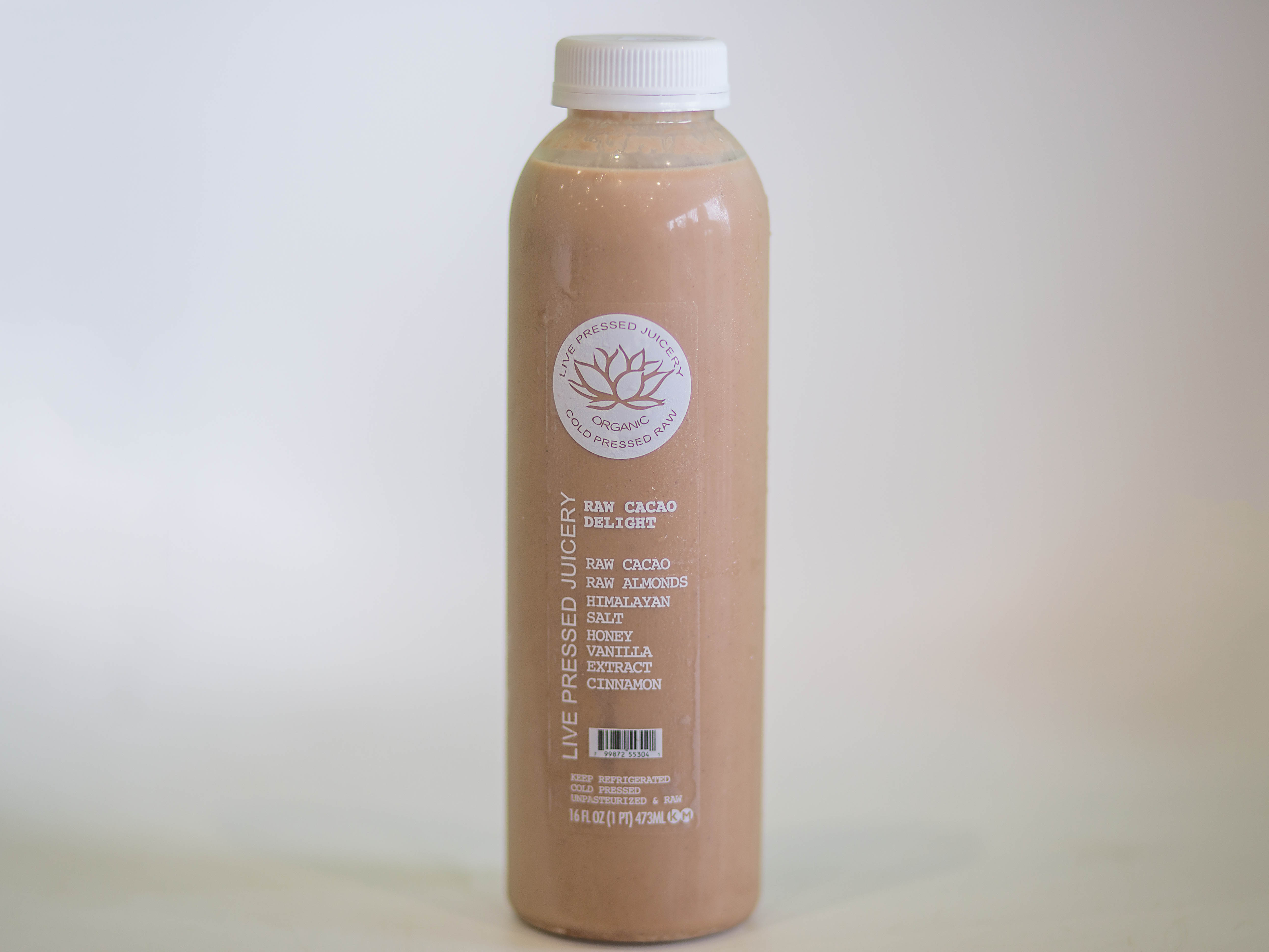Order Raw Cacao Delight Juice food online from Apple A Day Cafe store, Miami Beach on bringmethat.com